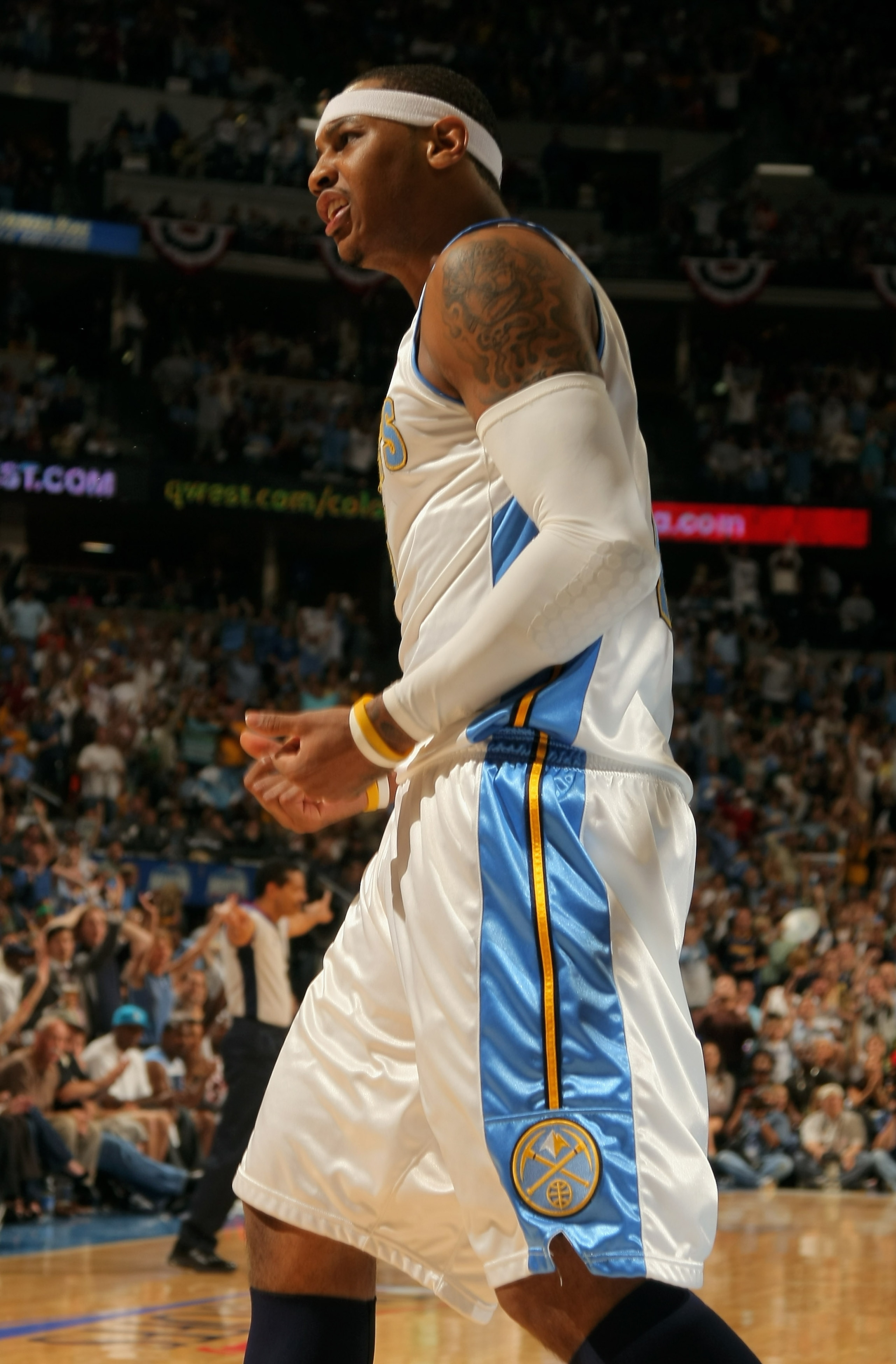 DENVER - MAY 13:  Carmelo Anthony #15 of the Denver Nuggets reacts after a play against the Dallas Mavericks in Game Five of the Western Conference Semifinals during the 2009 NBA Playoffs at Pepsi Center on May 13, 2009 in Denver, Colorado. NOTE TO USER: