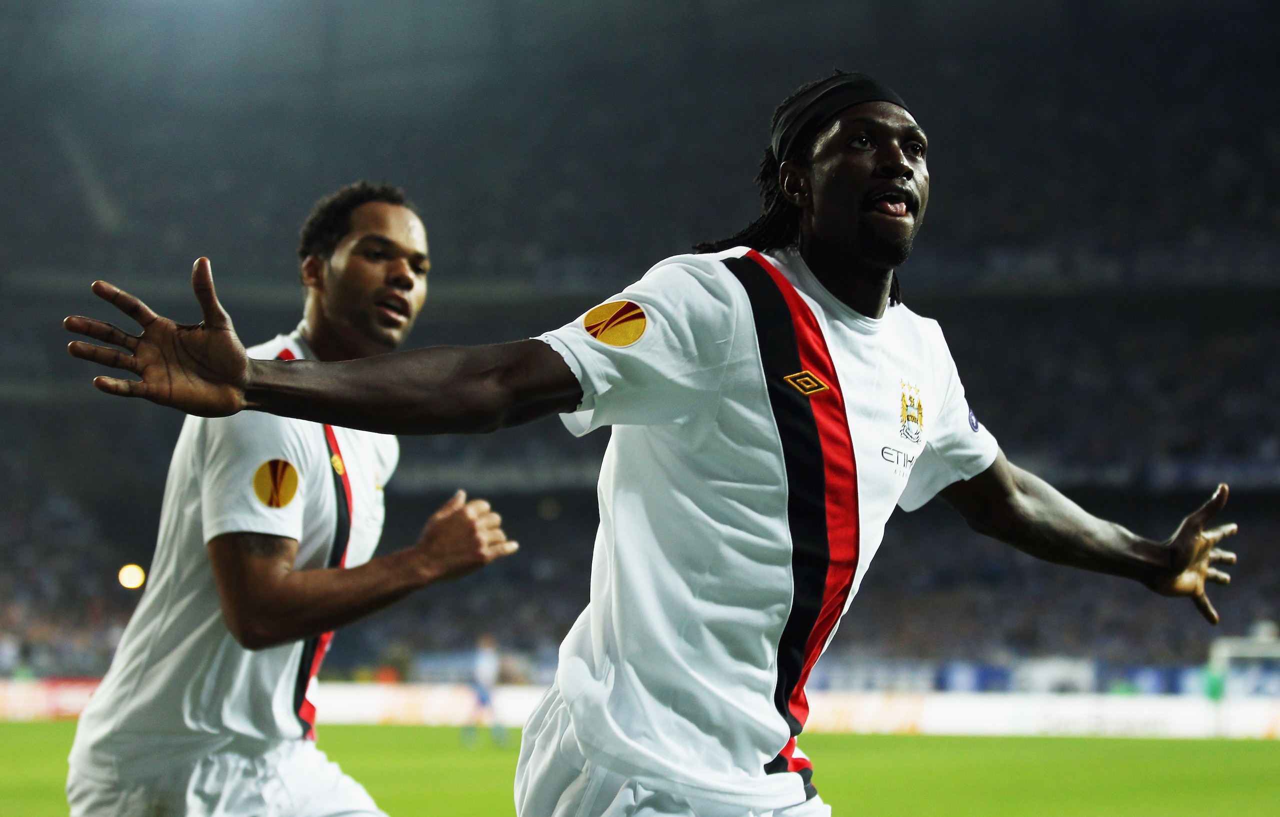 POZNAN, POLAND - NOVEMBER 04:  Emmanuel Adebayor of Manchester City celebrates scoring during the UEFA Europa League Group A match between KKS Lech Poznan and Manchester City at the Bulgarska Street Stadium on November 4, 2010 in Poznan, Poland.  (Photo b