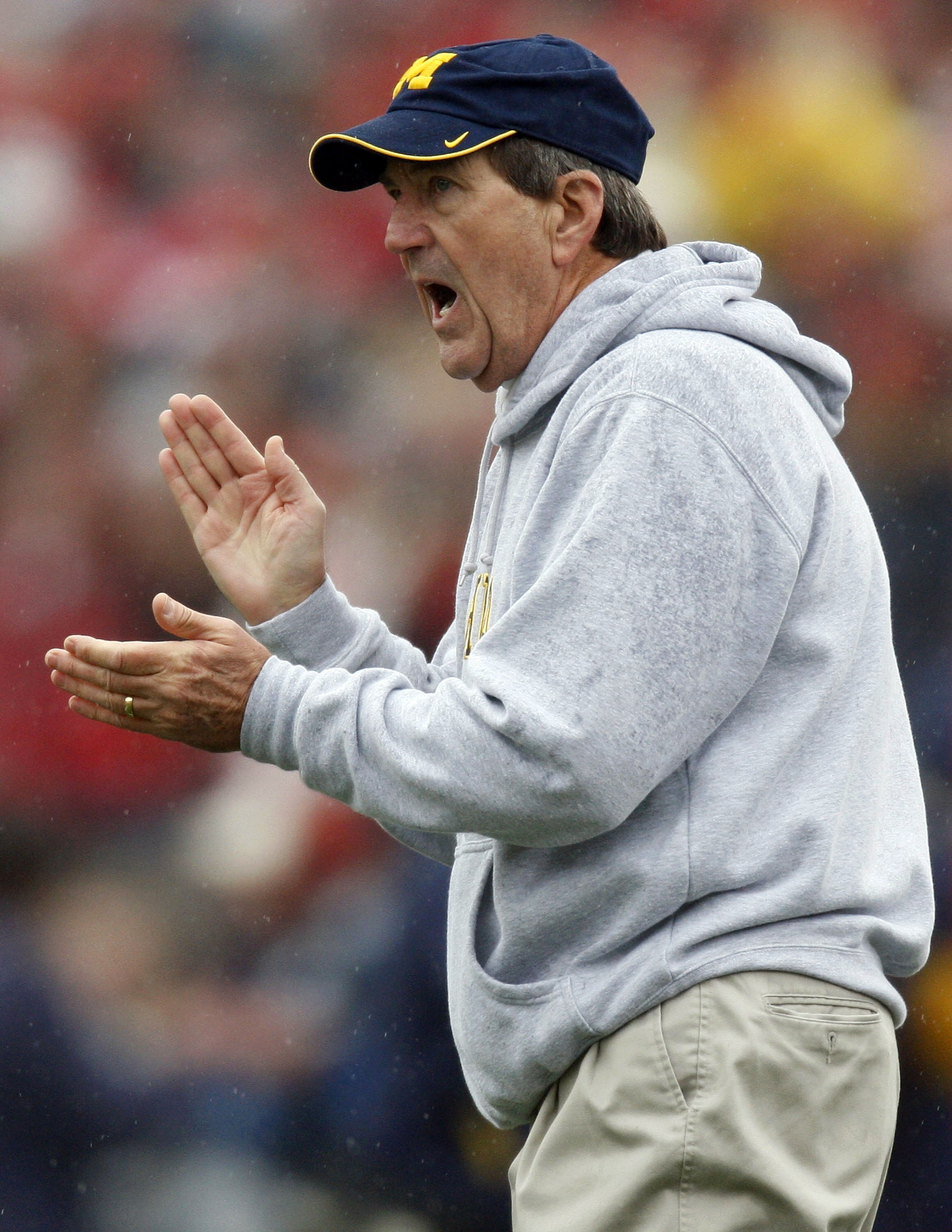 ANN ARBOR, MI - NOVEMBER 17:  Lloyd Carr head coach of the Michigan Wolverines cheers on his team during a game against the Ohio State Buckeyes on November 17, 2007 at Michigan Stadium in Ann Arbor, Michigan.  (Photo by Gregory Shamus/Getty Images)