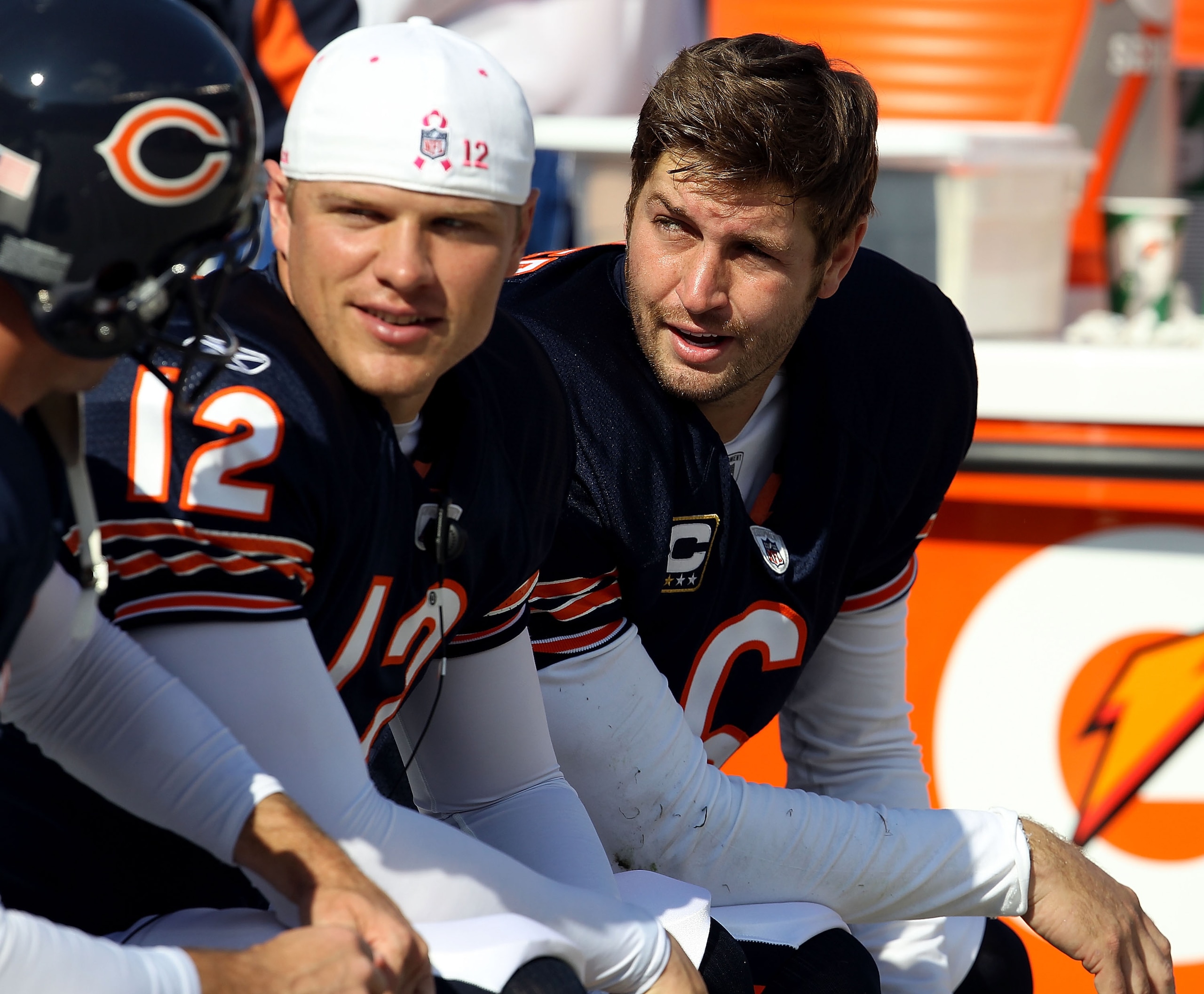CHICAGO - OCTOBER 24: Jay Cutler #6 of the Chicago Bears talks with teammates including Caleb Hanie #12 on the bench during a game against the Washington Redskins at Soldier Field on October 24, 2010 in Chicago, Illinois. The Redskins defeated the Bears 1