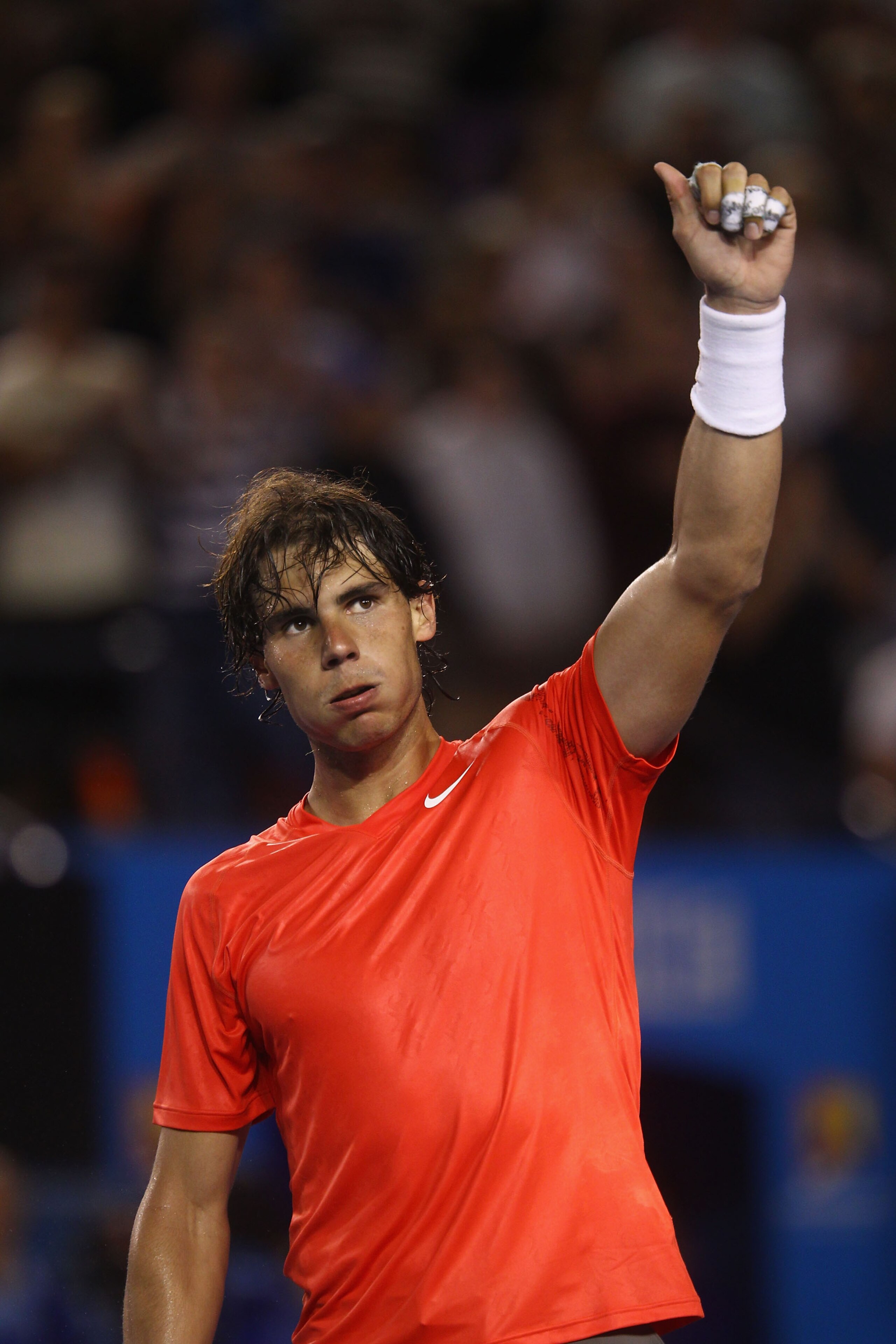 MELBOURNE, AUSTRALIA - JANUARY 22:  Rafael Nadal of Spain celebrates match point in his third round match against Bernard Tomic of Australia during day six of the 2011 Australian Open at Melbourne Park on January 22, 2011 in Melbourne, Australia.  (Photo