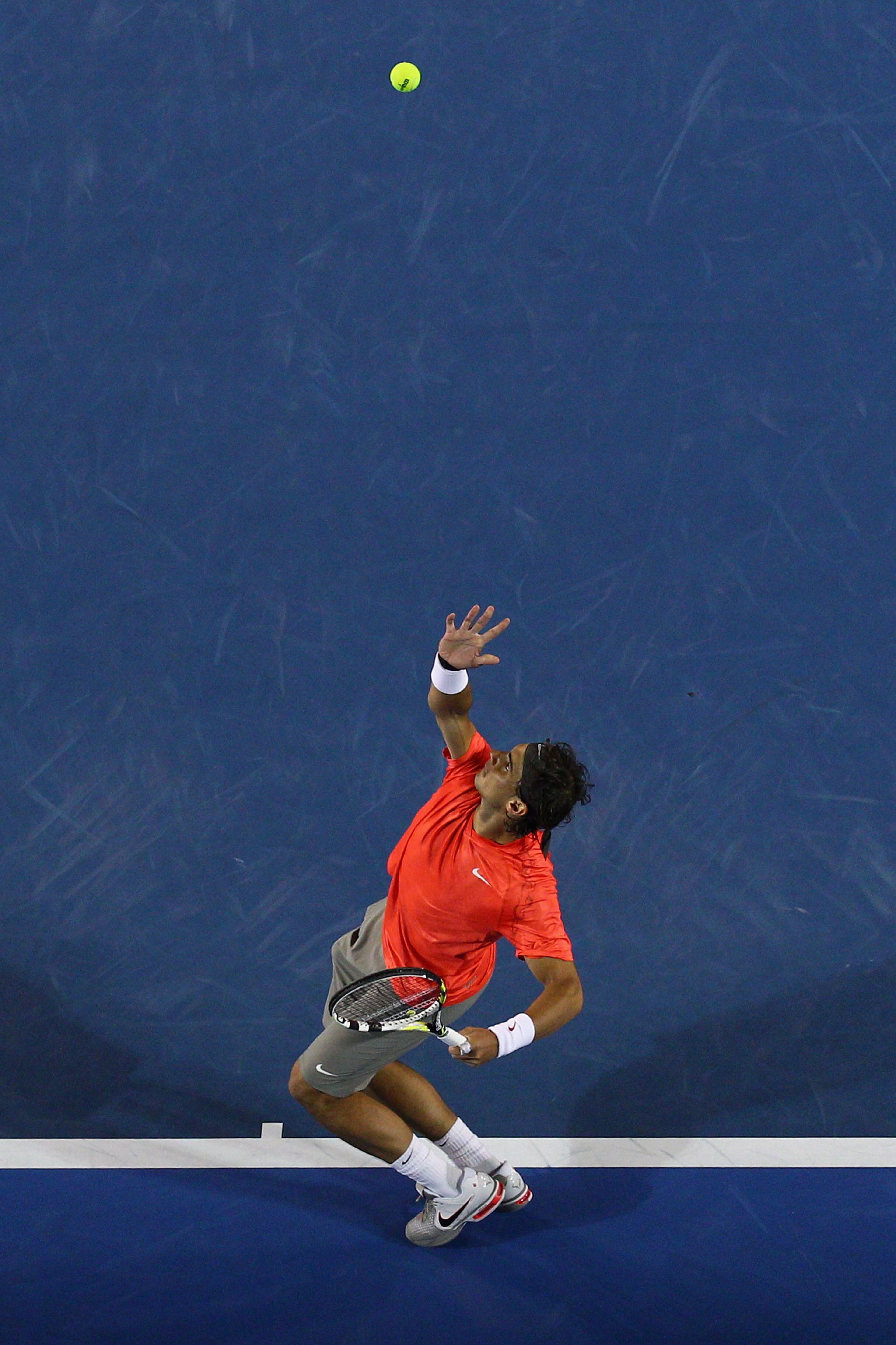 MELBOURNE, AUSTRALIA - JANUARY 24:  Rafael Nadal of Spain serves in his fourth round match against Marin Cilic of Croatia during day eight of the 2011 Australian Open at Melbourne Park on January 24, 2011 in Melbourne, Australia.  (Photo by Ryan Pierse/Ge