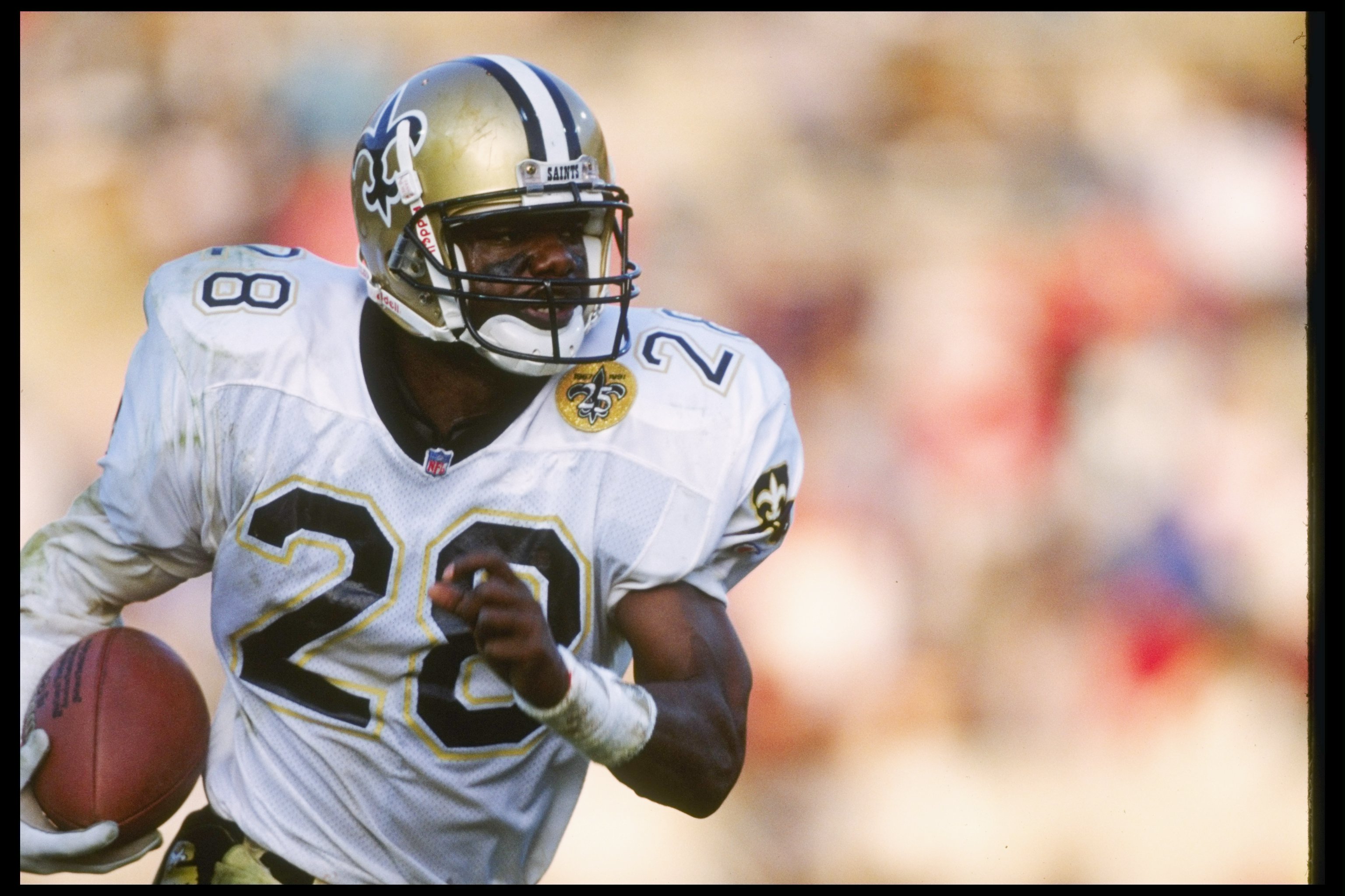 11 Dec 1988:  Defensive back Gene Atkins of the New Orleans Saints moves the ball during a game against the Los Angeles Rams at Anaheim Stadium in Anaheim, California.  The Saints won the game, 24-17. Mandatory Credit: Mike Powell  /Allsport