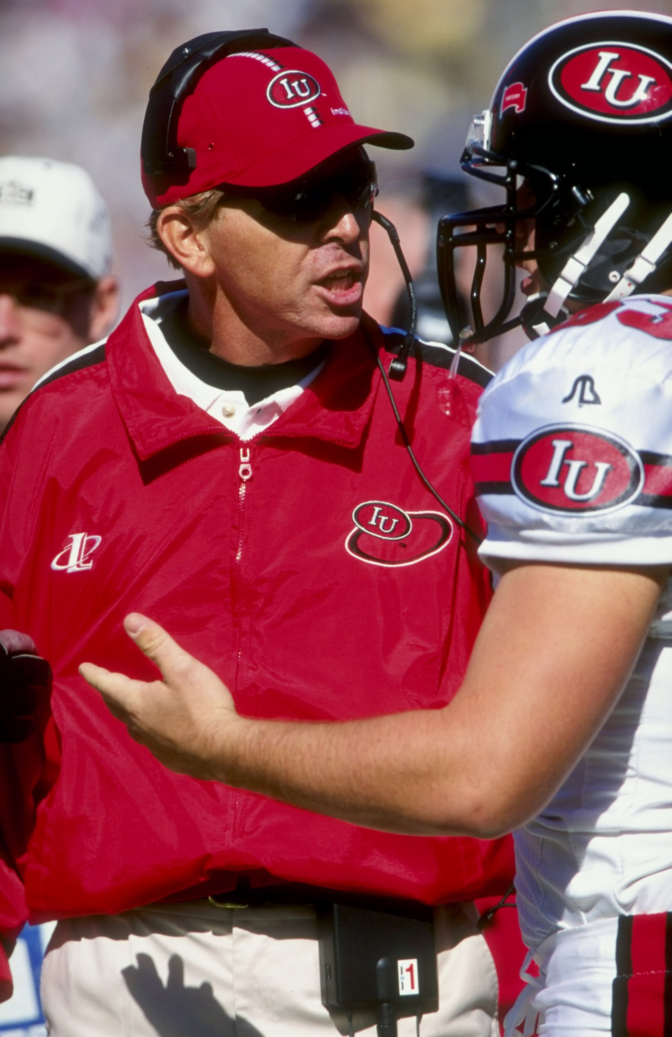 24 Oct 1998: Head coach Cam Cameron of the Indiana Hoosiers talks to a player during the game against the Michigan Wolverines at the Michigan Stadium in Ann Arbor, Michigan. The Wolverines defeated the Hoosiers 21-10. Mandatory Credit: Tom Pidgeon /Alls 24 Oct 1998: Head coach Cam Cameron of the Indiana Hoosiers talks to a player during the game against the Michigan Wolverines at the Michigan Stadium in Ann Arbor, Michigan. The Wolverines defeated the Hoosiers 21-10. Mandatory Credit: Tom Pidgeon /Alls