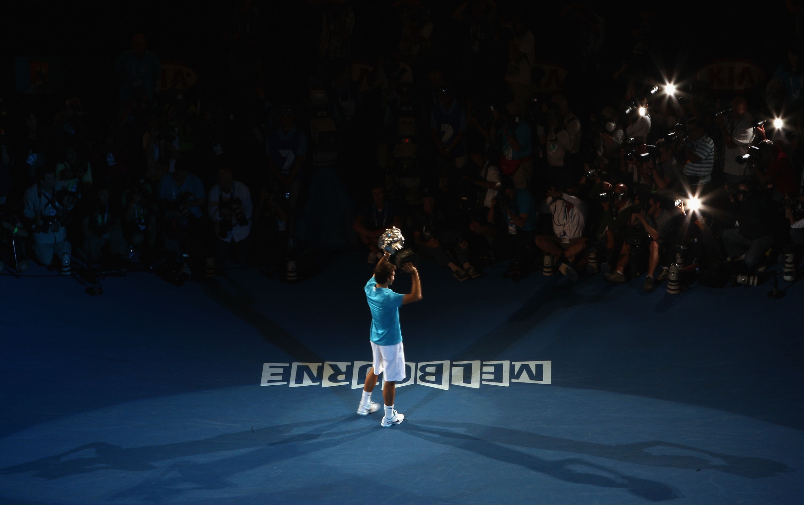 MELBOURNE, AUSTRALIA - JANUARY 31:  Roger Federer of Switzerland holds aloft the Norman Brookes Challenge Cup after his men's final match against Andy Murray of Great Britain during day fourteen of the 2010 Australian Open at Melbourne Park on January 31,