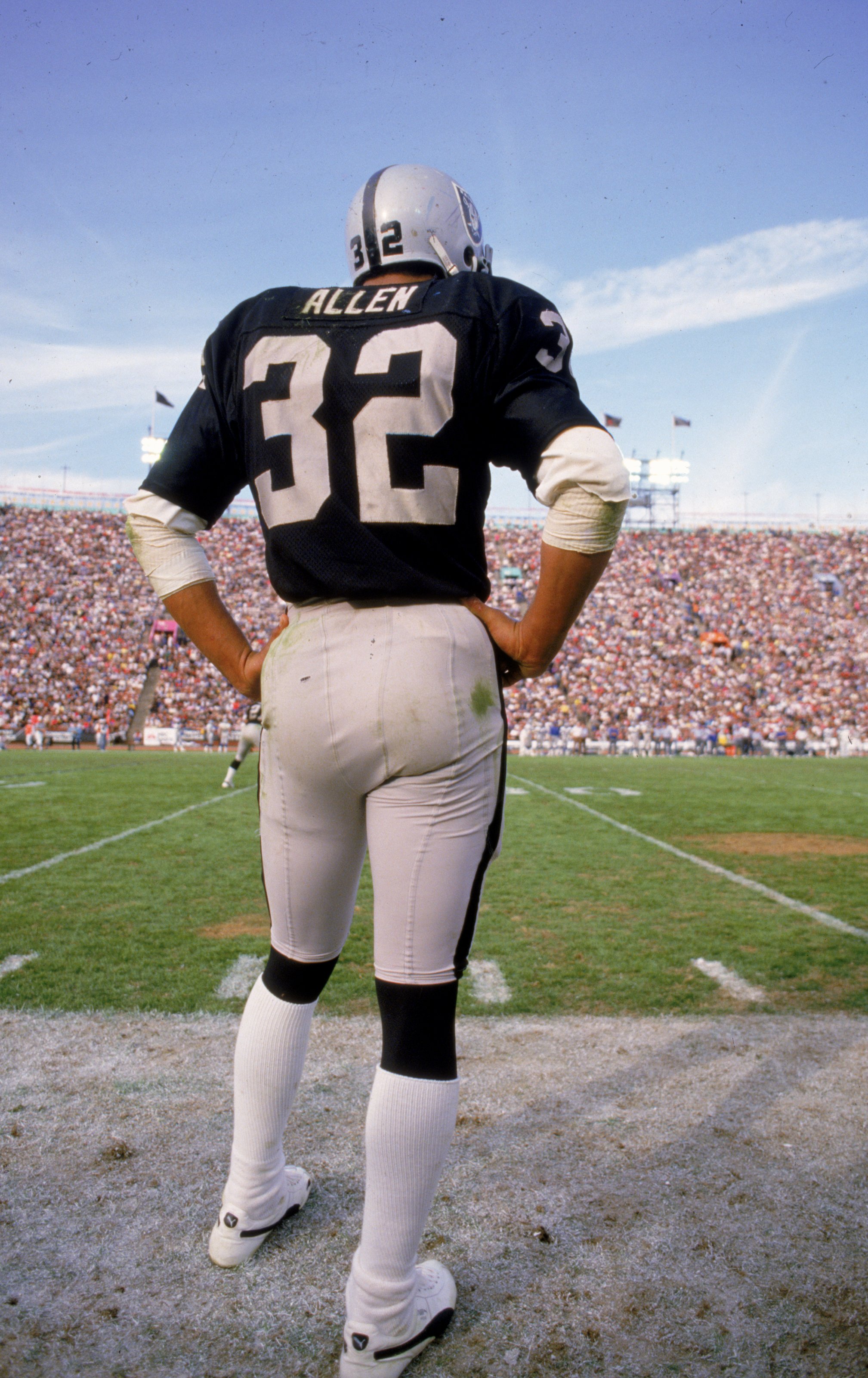 Undated:  Marcus Allen #32 of the Los Angeles Raiders stands on the sidelines during a game against the Seattle Seahawks at the Los Angeles Coliseum in Los Angeles, California. Mandatory Credit: Mike Powell  /Allsport