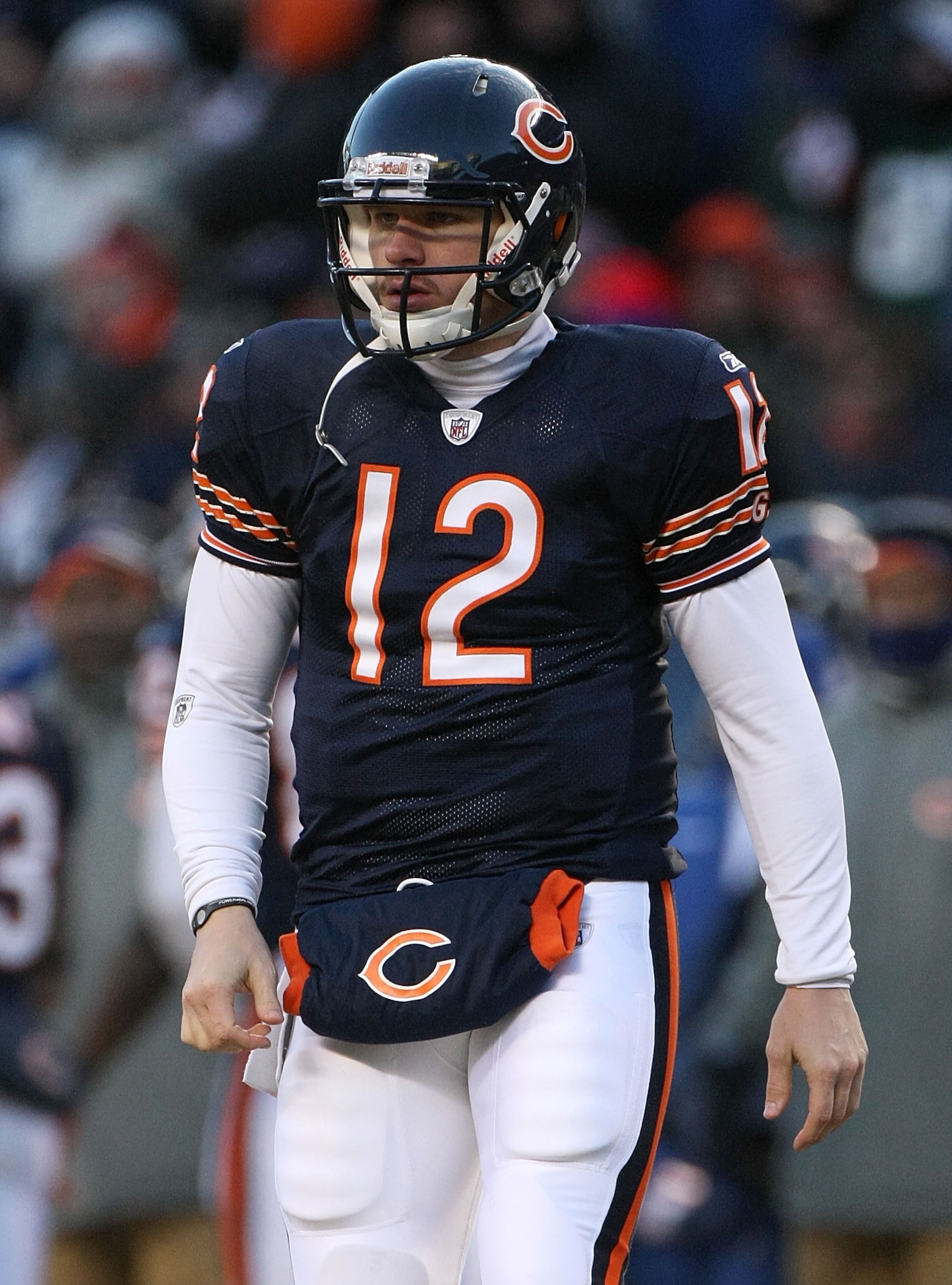 CHICAGO, IL - JANUARY 23:  Quarterback Caleb Hanie #12 of the Chicago Bears looks on while taking on the Green Bay Packers in the NFC Championship Game at Soldier Field on January 23, 2011 in Chicago, Illinois.  (Photo by Doug Pensinger/Getty Images)