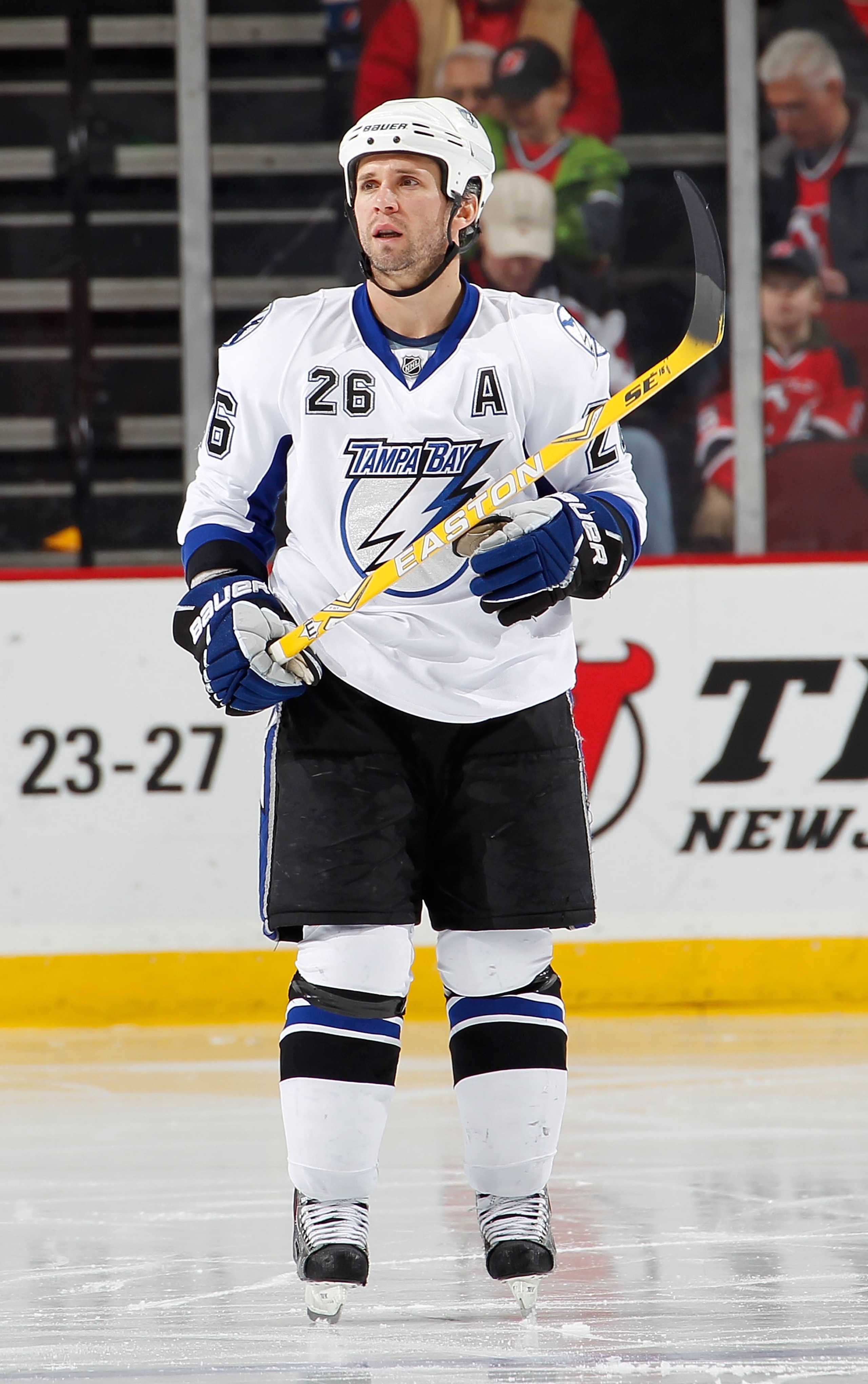 NEWARK, NJ - JANUARY 09:  Martin St. Louis #26 of the Tampa Bay Lightning looks up during a break in an NHL hockey game against the New Jersey Devils at the Prudential Center on January 9, 2011 in Newark, New Jersey.  (Photo by Paul Bereswill/Getty Images