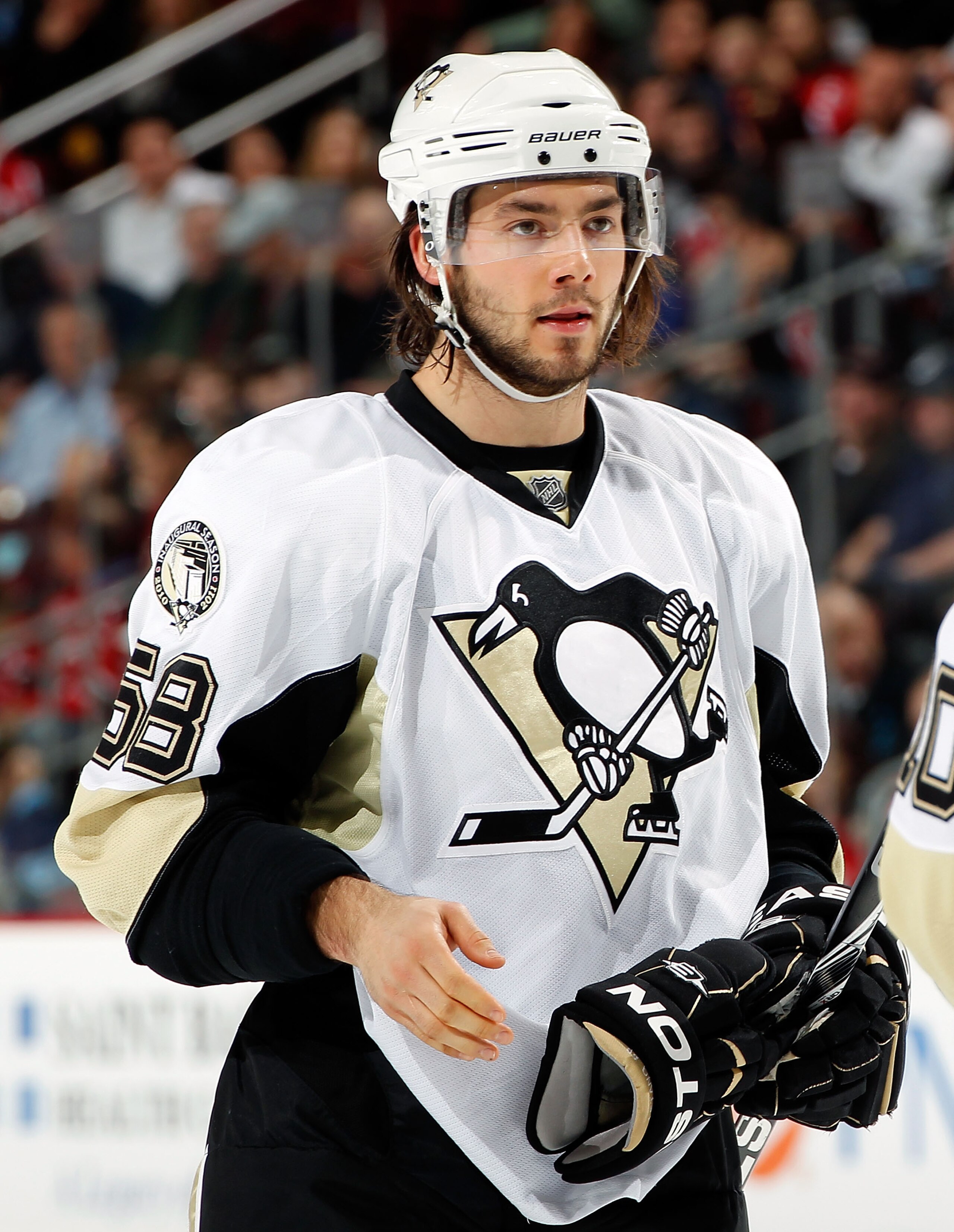 NEWARK, NJ - JANUARY 20:  Kris Letang #58 of the Pittsburgh Penguins waits for a faceoff in an NHL hockey game against the New Jersey Devils at the Prudential Center on January 20, 2011 in Newark, New Jersey.  (Photo by Paul Bereswill/Getty Images)