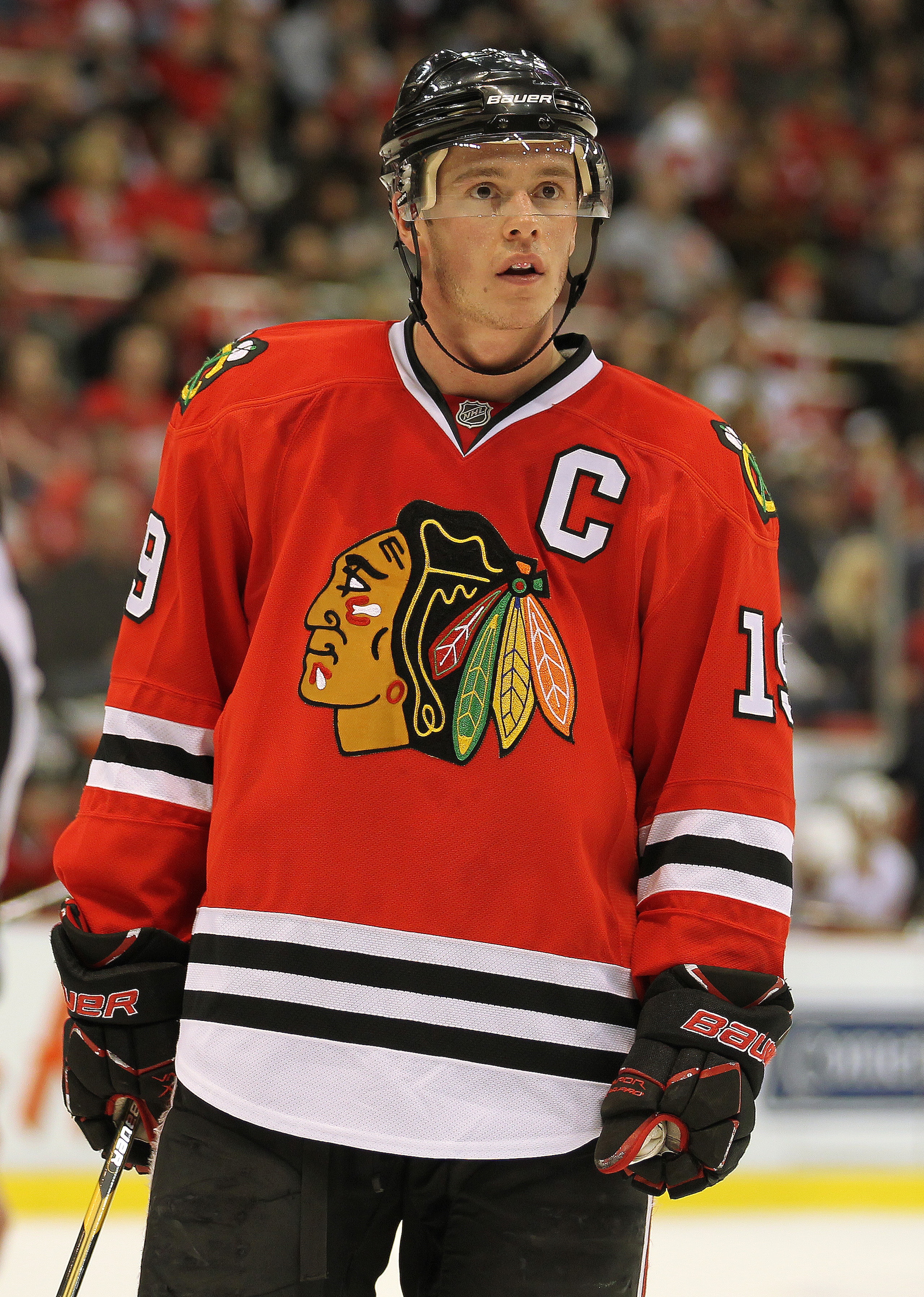 DETROIT, MI - JANUARY 22:  Jonathan Toews #19 of the Chicago Black Hawks waits for a faceoff in a game against the Detroit Red Wings on January 22, 2011 at the Joe Louis Arena in Detroit, Michigan. The Hawks defeated the Wings 4-1. (Photo by Claus Anderse