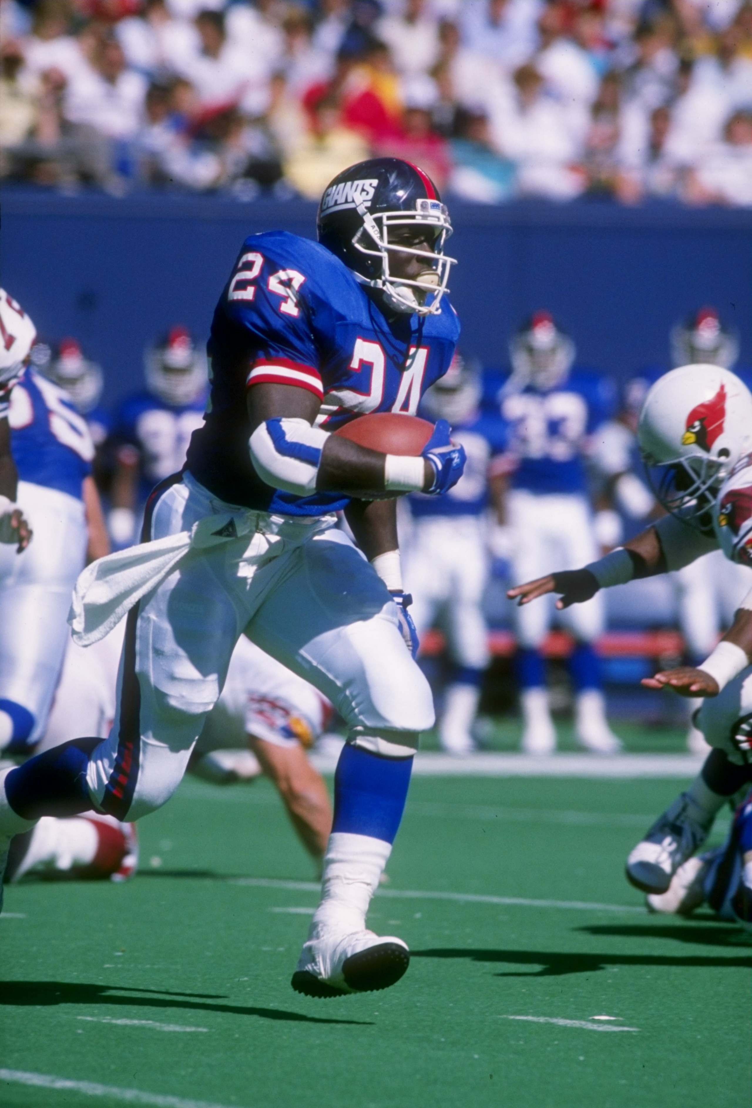 24 Sep 1989: Running back Ottis Anderson of the New York Giants runs with the ball during a game against the Phoenix Cardinals at Giants Stadium in the Meadowlands in East Rutherford, New Jersey. The Giants won the game 35-7.