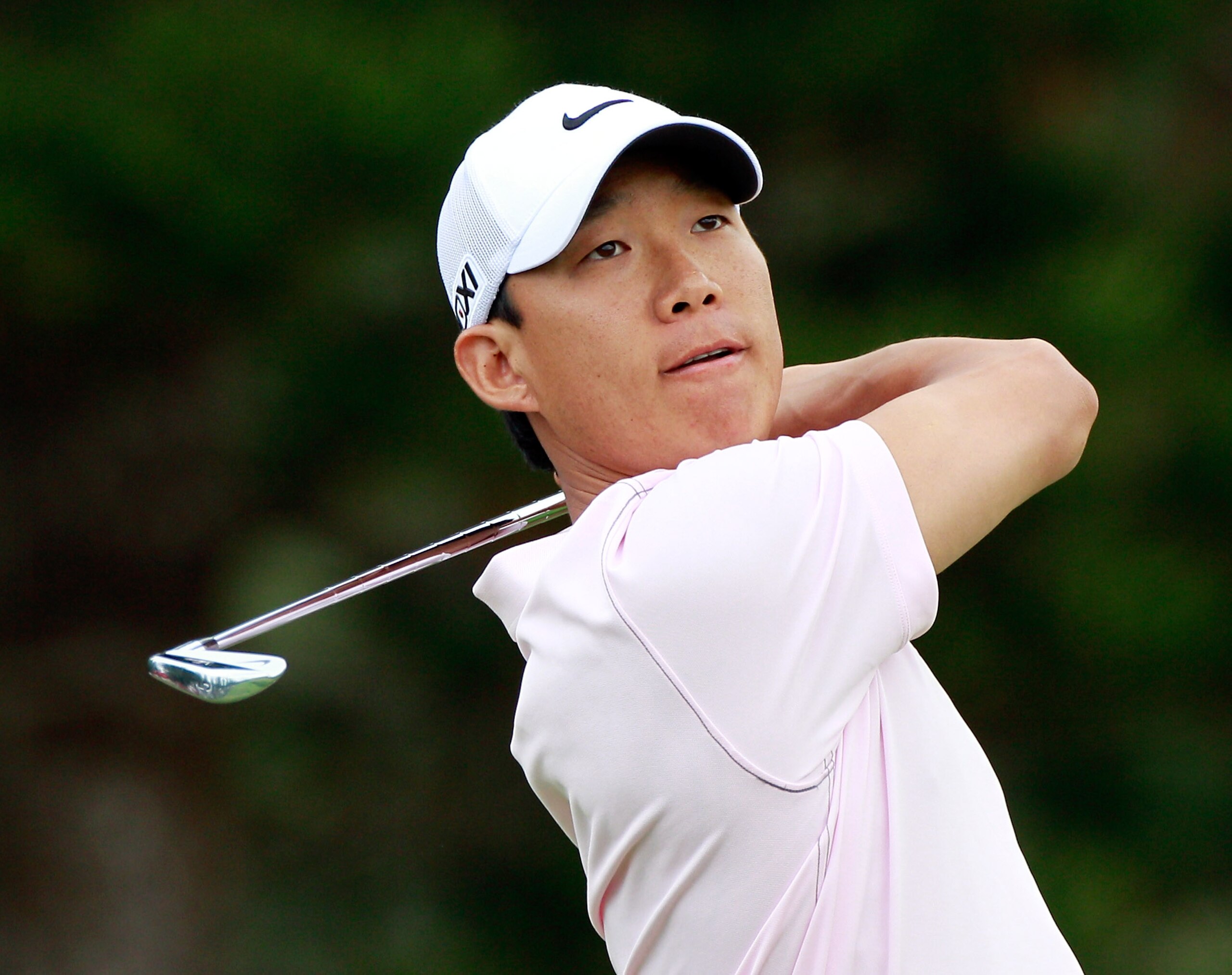 KAPALUA, HI - JANUARY 07:  Anthony Kim hits a shot during the second round of the Hyundai Tournament of Champions at the Plantation course on January 7, 2011 in Kapalua, Hawaii.  (Photo by Sam Greenwood/Getty Images)