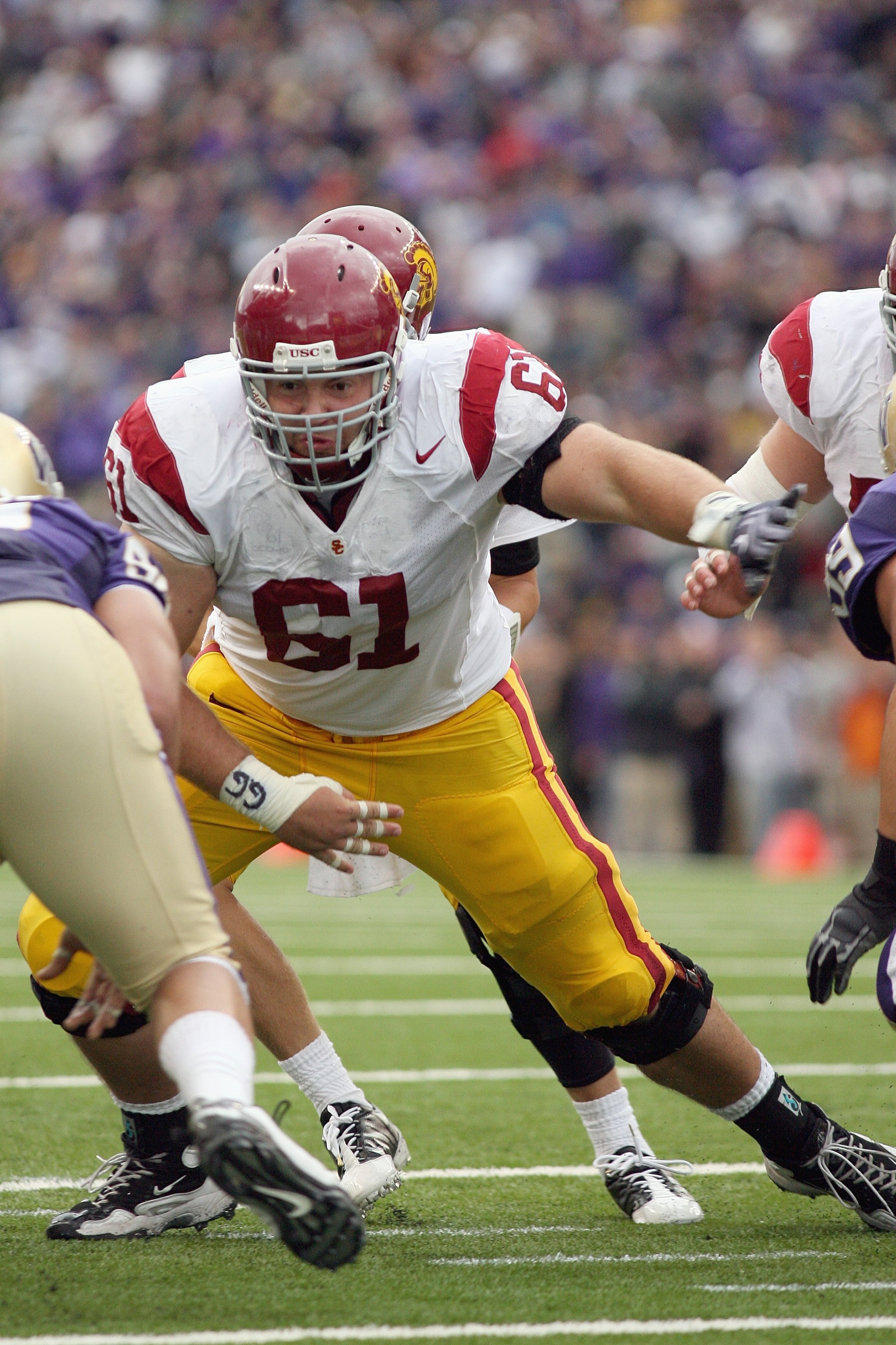 SEATTLE - SEPTEMBER 19:  Center Kristofer O'Dowd #61 of the USC Trojans moves on the line during the game against the Washington Huskies on September 19, 2009 at Husky Stadium in Seattle, Washington. The Huskies defeated the Trojans 16-13. (Photo by Otto