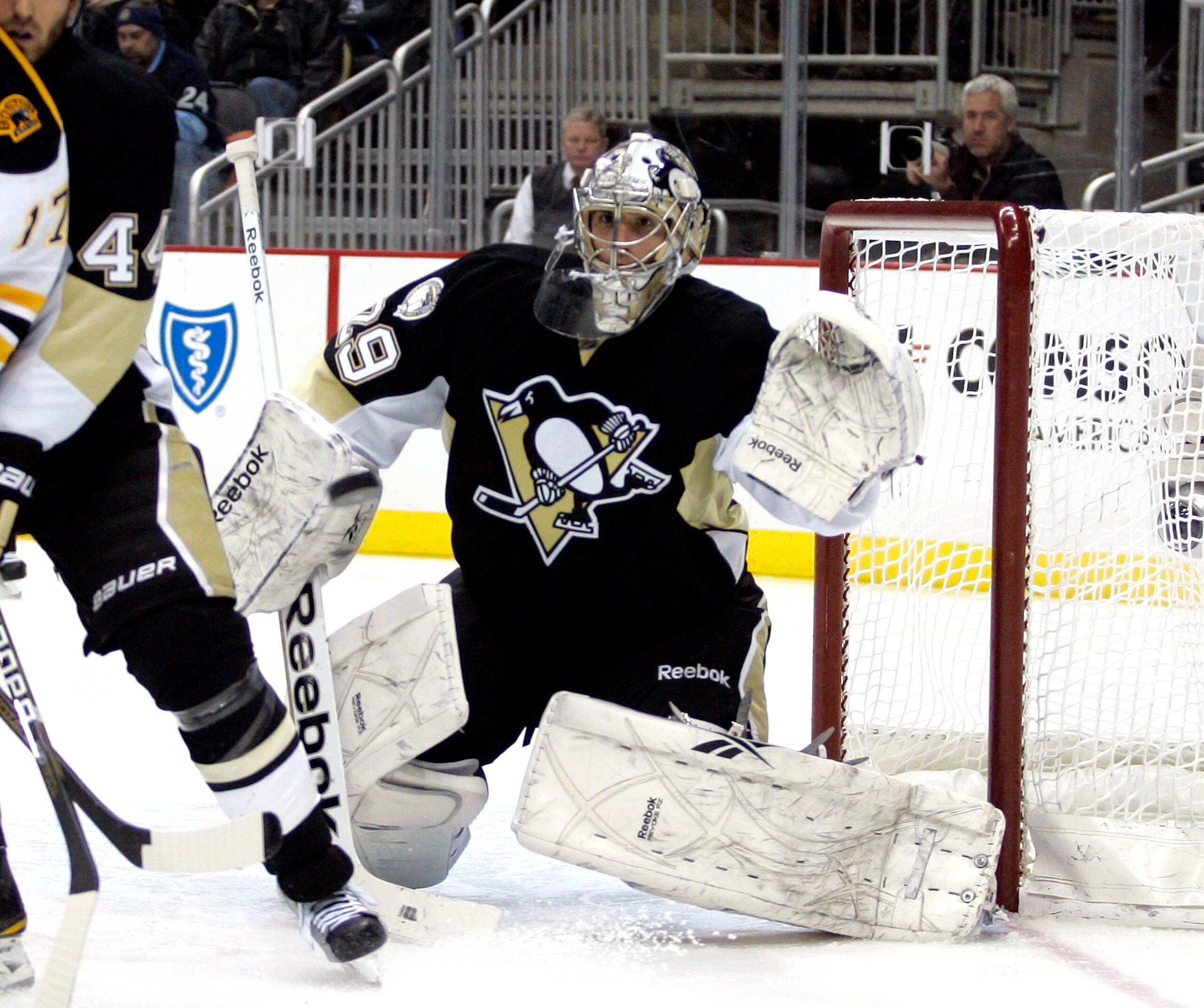 PITTSBURGH, PA - JANUARY 10:  Marc-Andre Fleury #29 of the Pittsburgh Penguins makes a save against the Boston Bruins on January 10, 2011 at Consol Energy Center in Pittsburgh, Pennsylvania.  (Photo by Justin K. Aller/Getty Images)