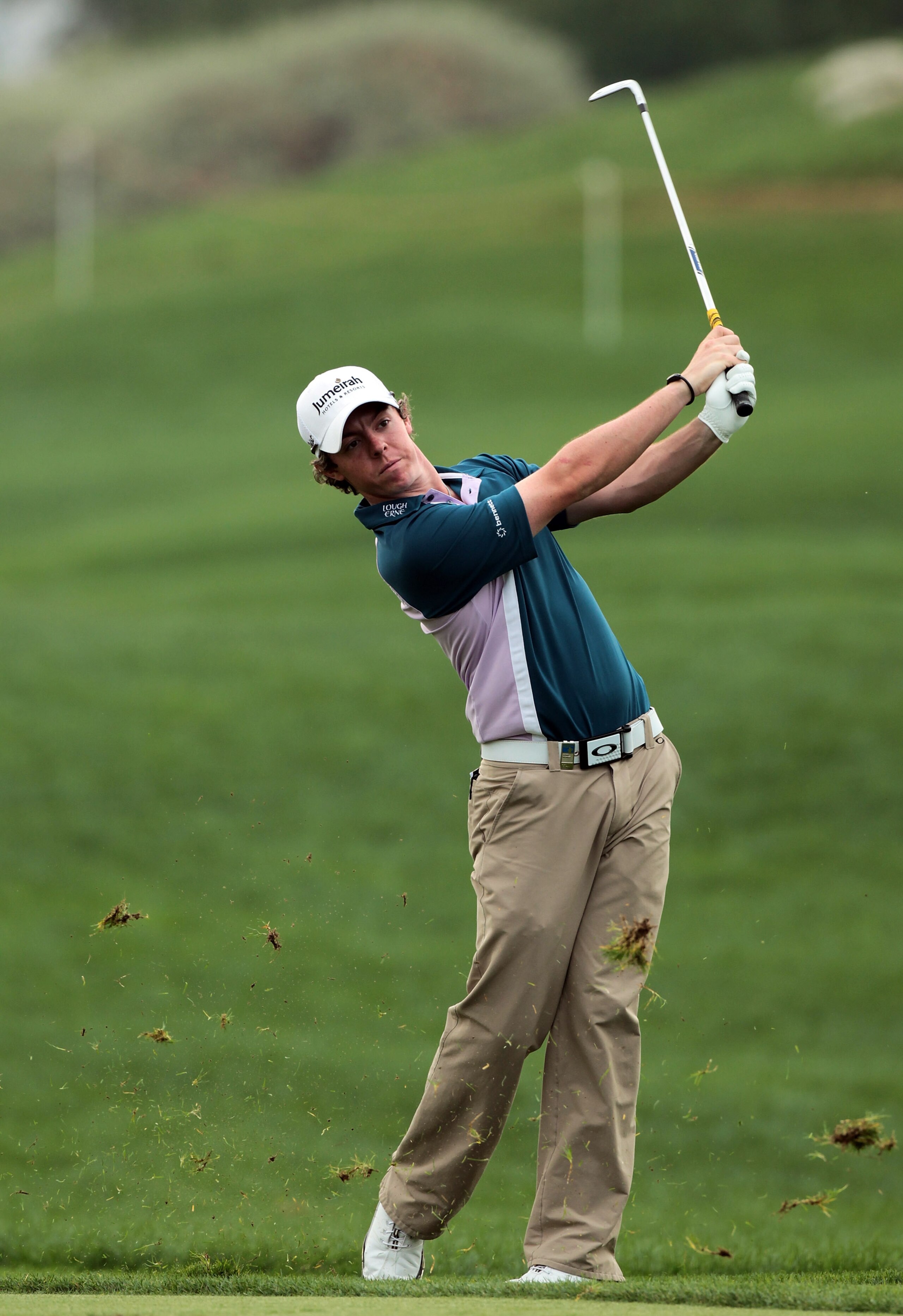 ABU DHABI, UNITED ARAB EMIRATES - JANUARY 22:  Rory McIlroy of Northern Ireland plays his second shot to the 13th hole during the final round of the 2011 Abu Dhabi HSBC Golf Championship held at the Abu Dhabi Golf Club on January 23, 2011 in Abu Dhabi, Un