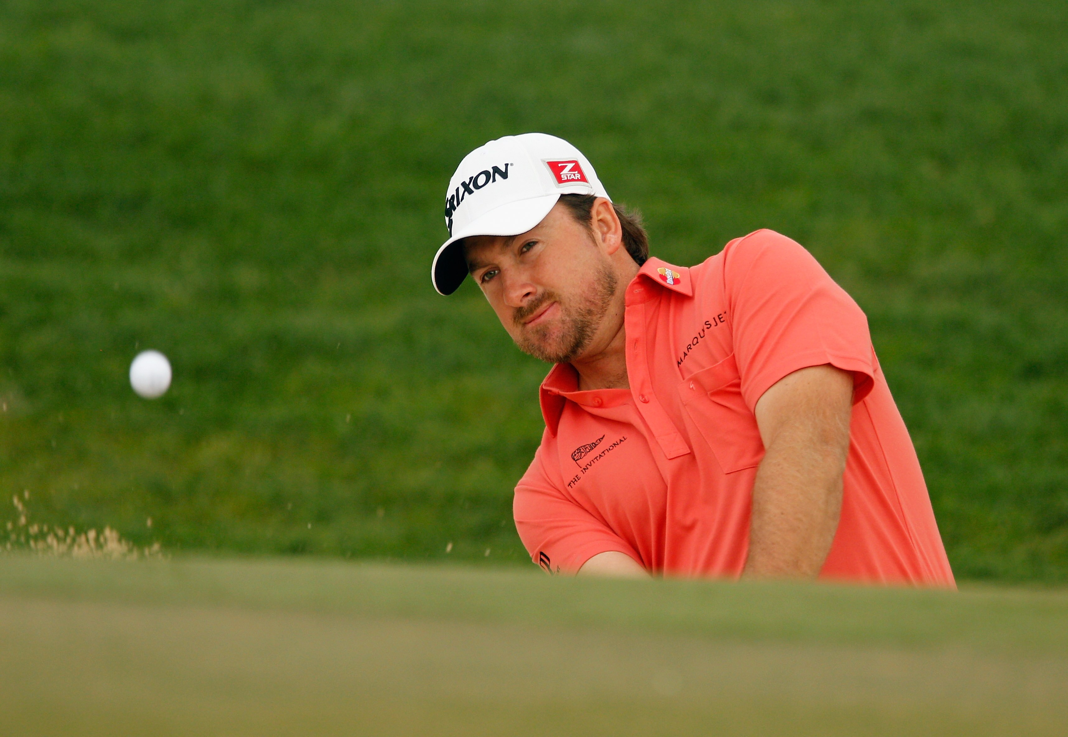 ABU DHABI, UNITED ARAB EMIRATES - JANUARY 19: Graeme McDowell of Northern Ireland hits a bunker shot during the pro-am prior to the start of the 2011 Abu Dhabi HSBC Golf Championship at the Abu Dhabi Golf Club on January 19, 2011 in Abu Dhabi, United Arab