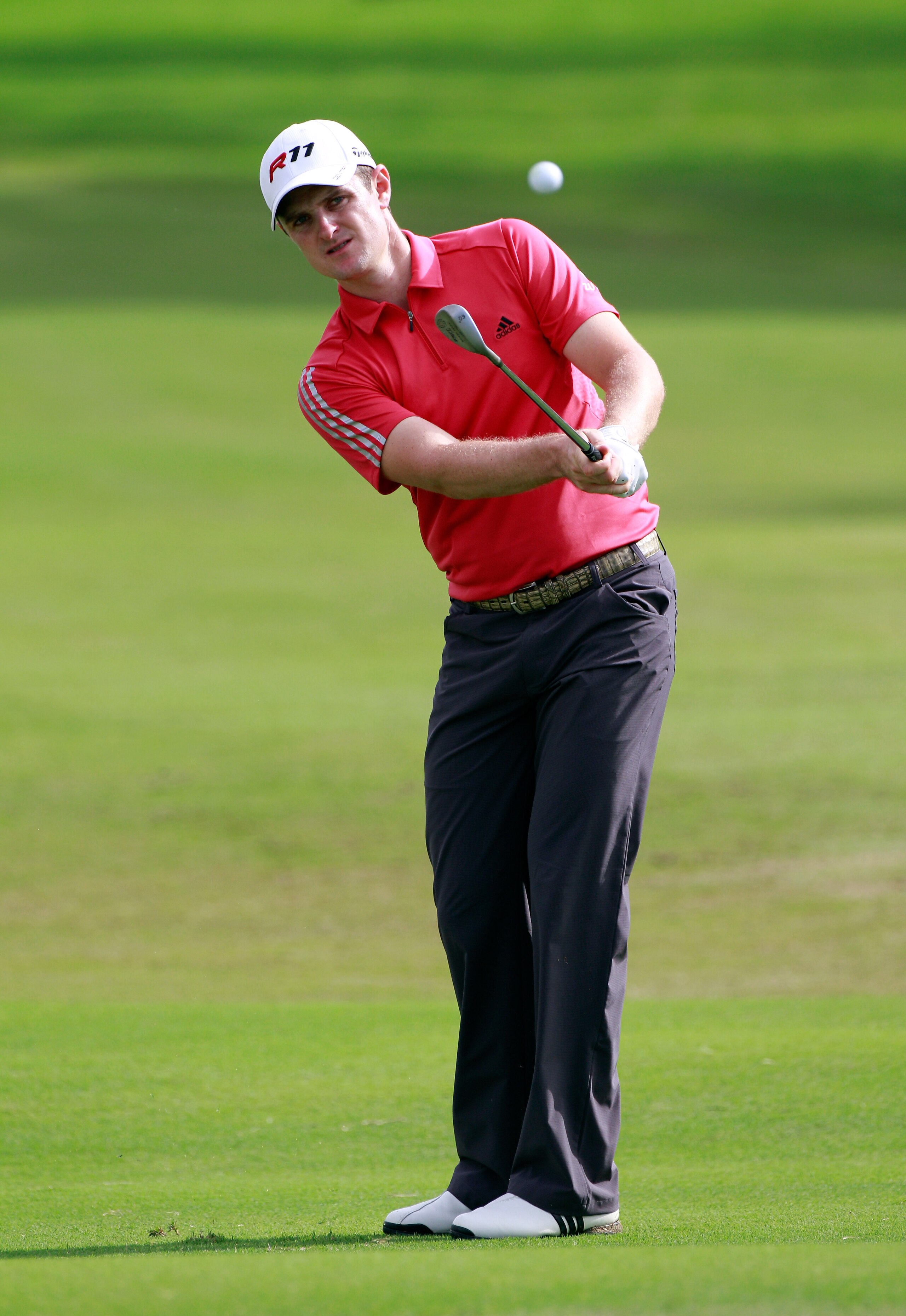HONOLULU, HI - JANUARY 16:  Justin Rose of England plays a shot during the third round of the Sony Open at Waialae Country Club on January 16, 2011 in Honolulu, Hawaii.  (Photo by Sam Greenwood/Getty Images)