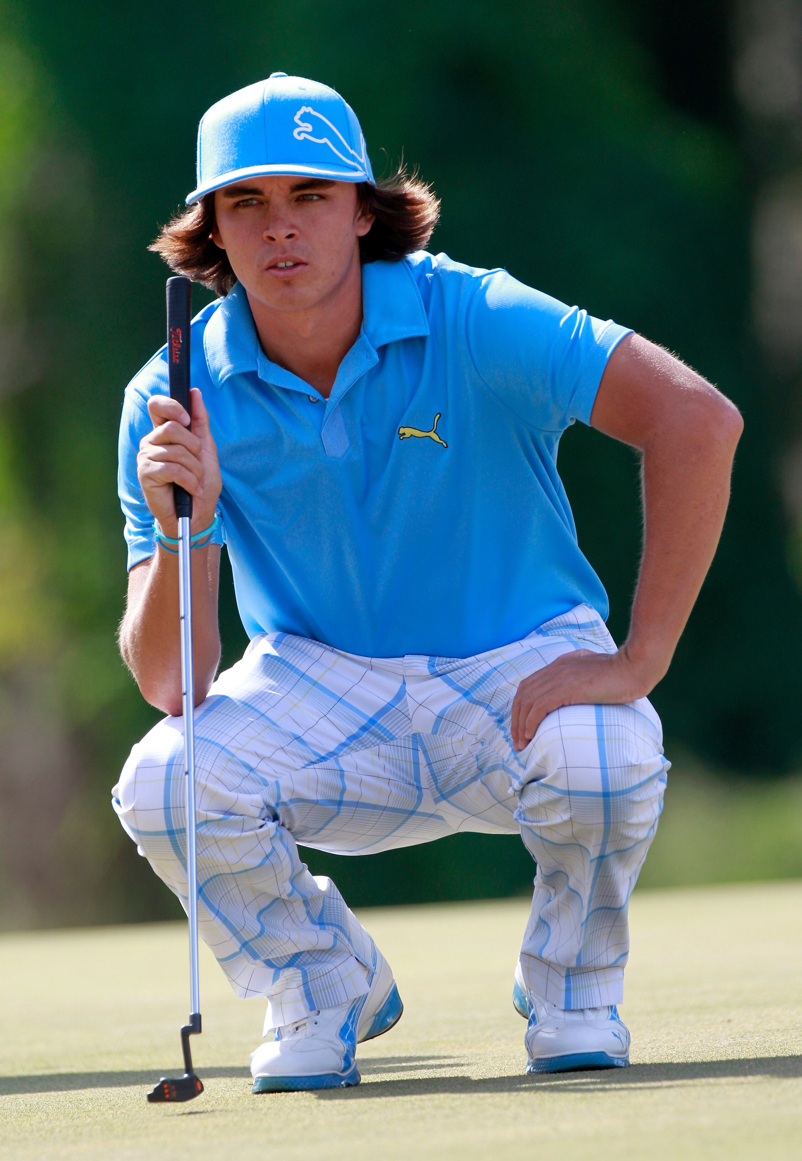 LAKE BUENA VISTA, FL - NOVEMBER 12:  Rickie Fowler looks over a birdie putt on the 3rd hole during the second round of the Children's Miracle Network Classic at the Disney Palm and Magnolia course on November 12, 2010 in Lake Buena Vista, Florida.  (Photo