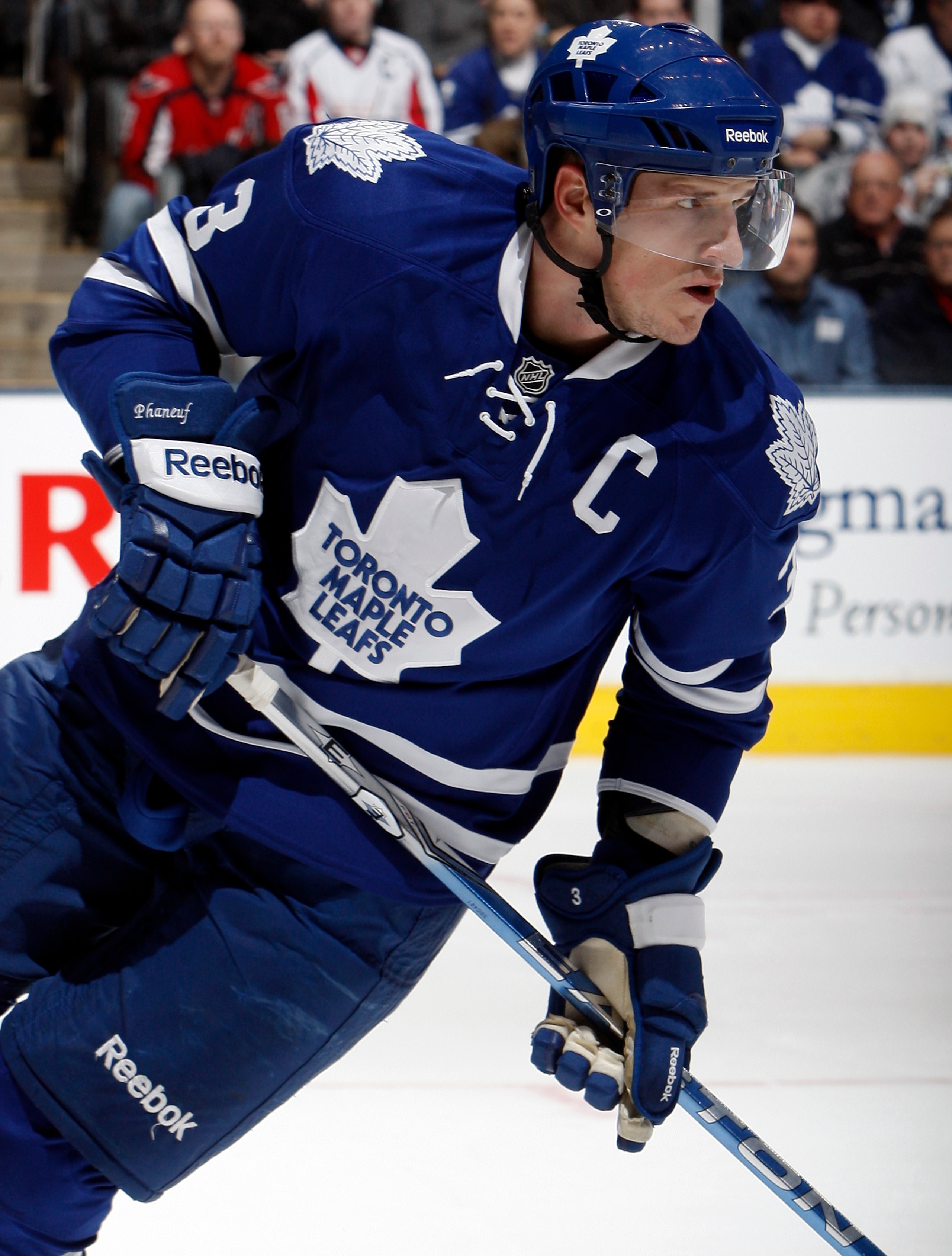 TORONTO, CANADA - JANUARY 22:  Dion Phaneuf #3 of the Toronto Maple Leafs skates up the ice during game action at the Air Canada Centre against the Washington Capitals January 22, 2011 in Toronto, Ontario, Canada. (Photo by Abelimages/Getty Images)