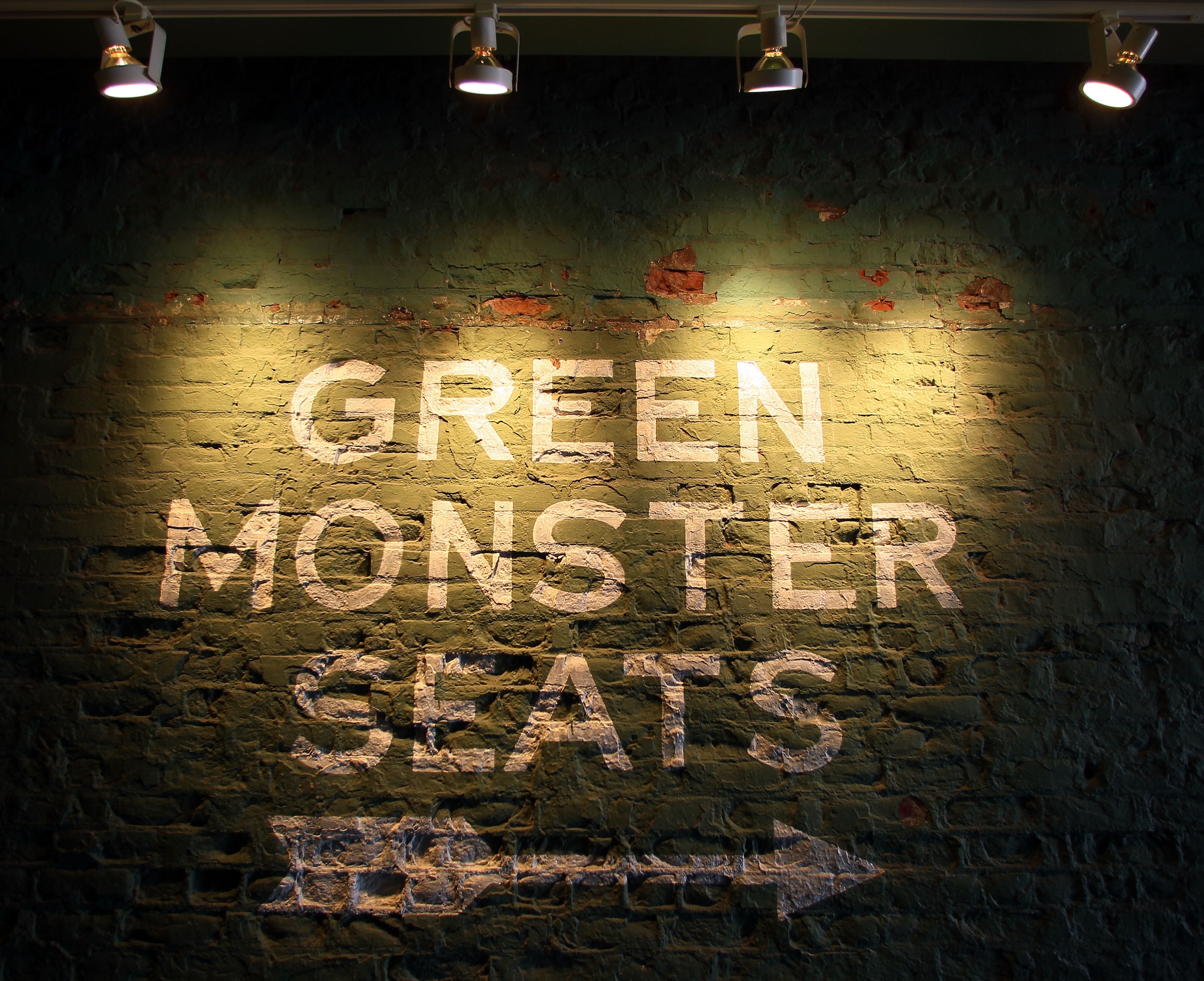 BOSTON - AUGUST 01:  The sign directs fans to the Green Monster seats during the game between the Detroit Tigers and the Boston Red Sox on August 1, 2010 at Fenway Park in Boston, Massachusetts.  (Photo by Elsa/Getty Images)