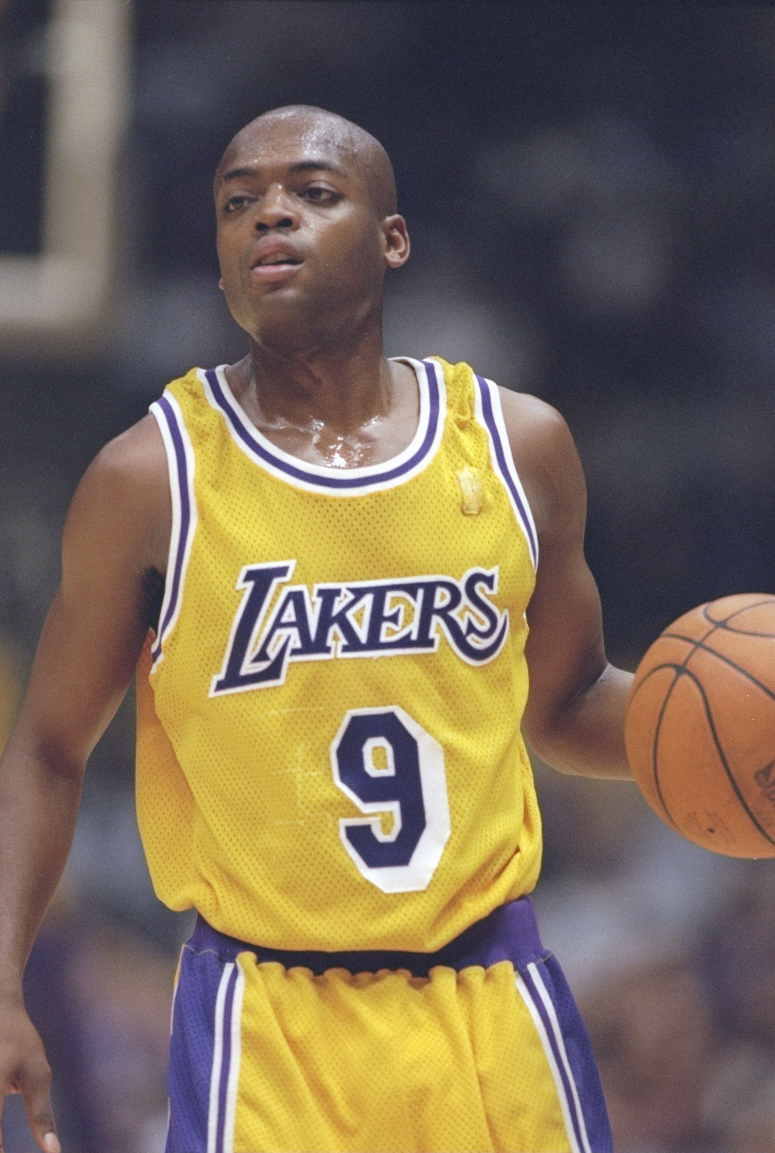 3 Dec 1996:  Guard Nick Van Exel of the Los Angeles Lakers dribbles the ball down the court during a game against the Seattle Supersonics at the Great Western Forum in Inglewood, California.  The Lakers won the game 110-106. Mandatory Credit: Stephen Dunn