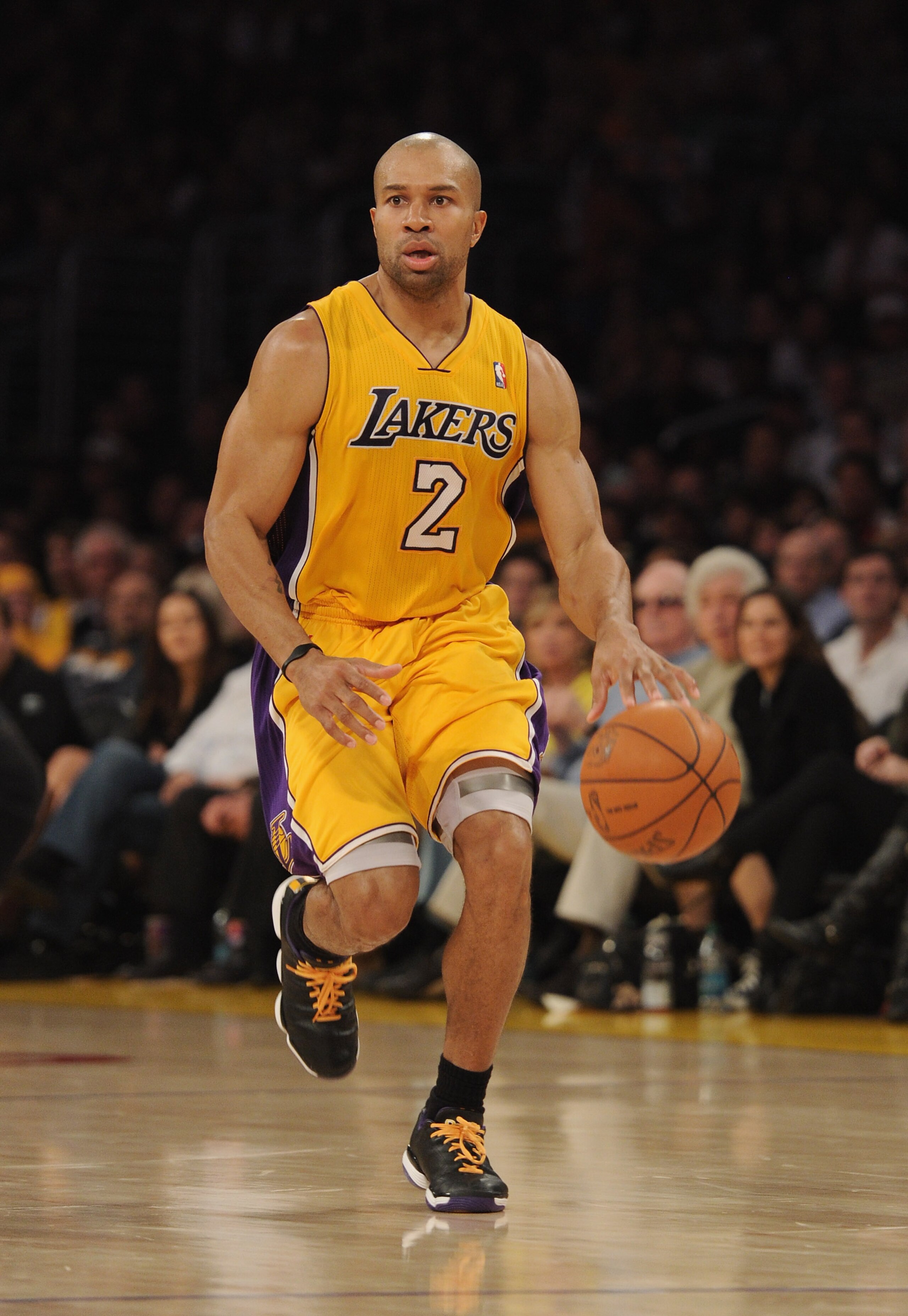 LOS ANGELES, CA - JANUARY 17:  Derek Fisher #2 of the Los Angeles Lakers dribbles during the game against the Oklahoma City Thunder at the Staples Center on January 17, 2011 in Los Angeles, California.  (Photo by Harry How/Getty Images)   NOTE TO USER: Us