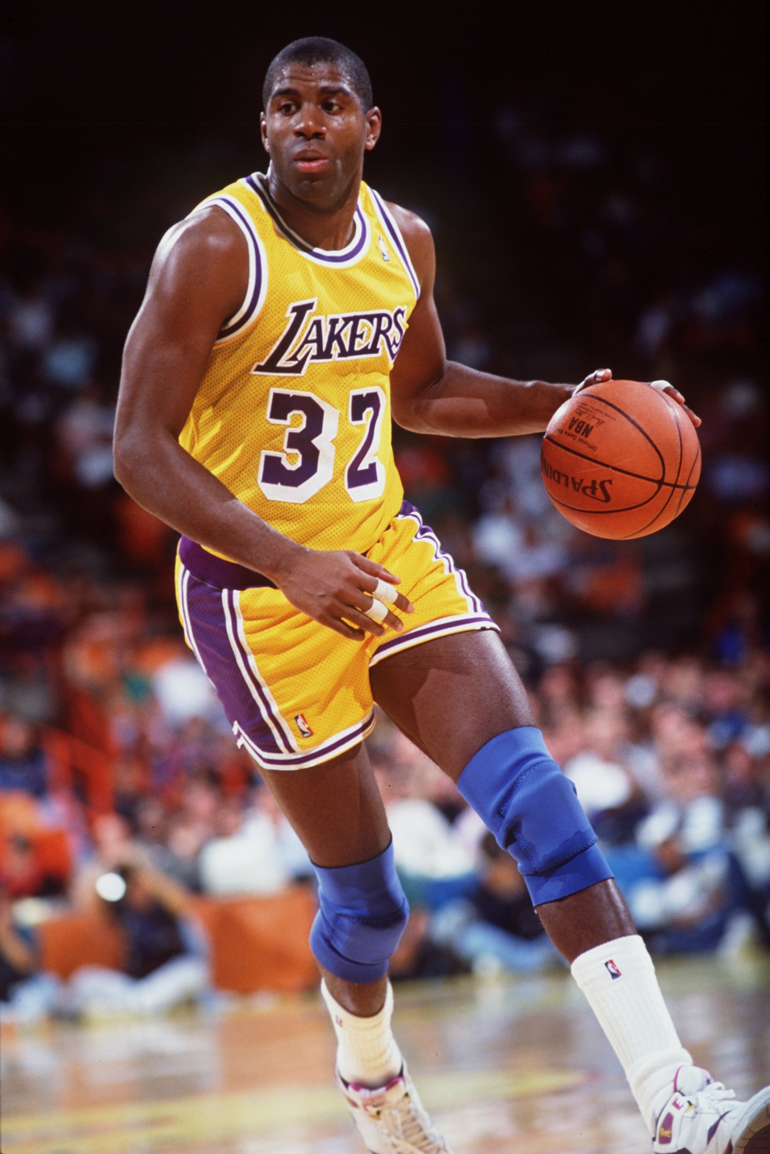 1990-1991:  Earvin Magic Johnson of the Los Angeles Lakers in action against the Portland Trailblazers.  Mandatory Credit: Stephen Dunn/Allsport