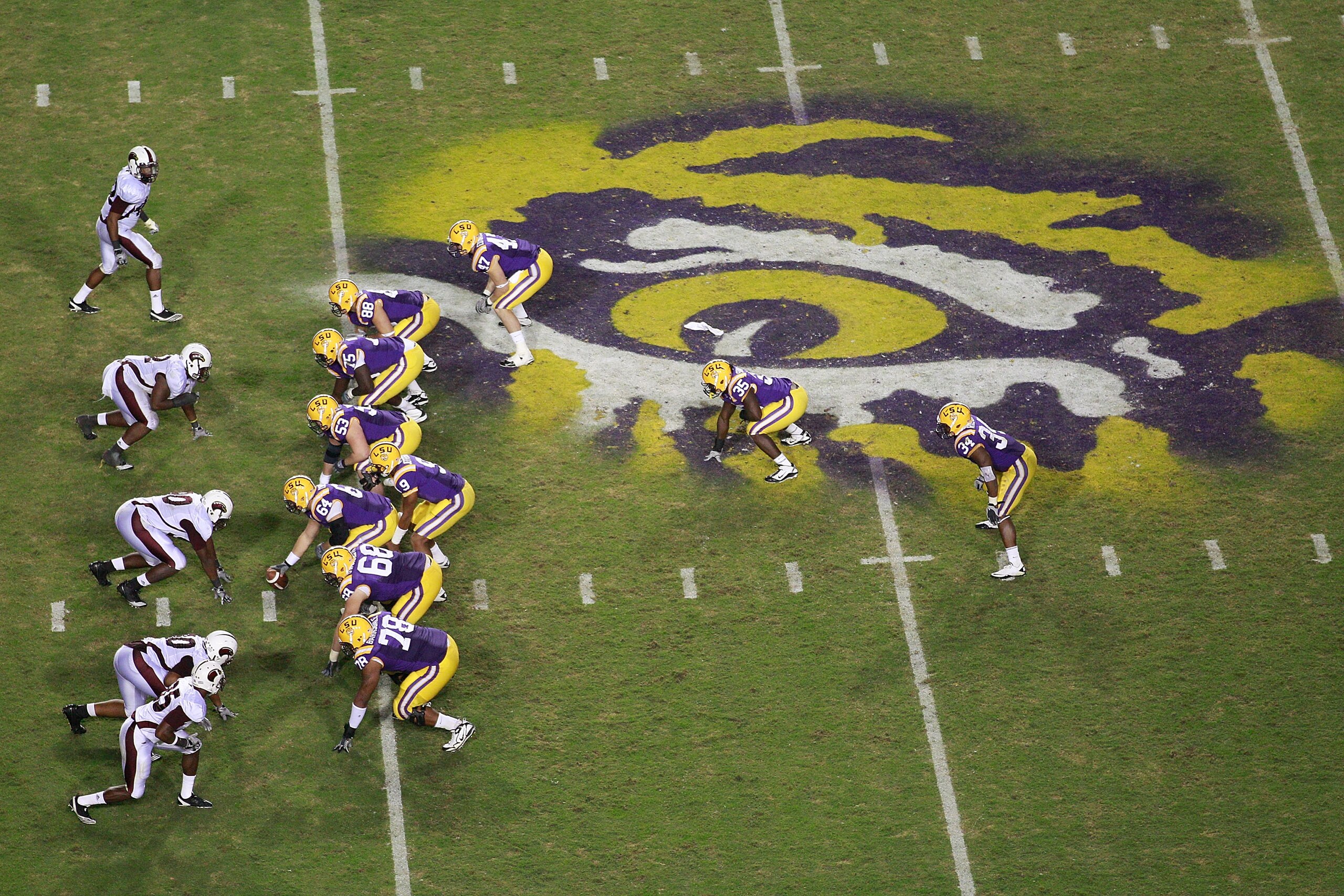 BATON ROUGE, LA - NOVEMBER 13:  Jordan Jefferson #9 of the Louisiana State University Tigers prepares to take the snap during the game against the University of Louisiana-Monroe Warhawks at Tiger Stadium on November 13, 2010 in Baton Rouge, Louisiana.   T