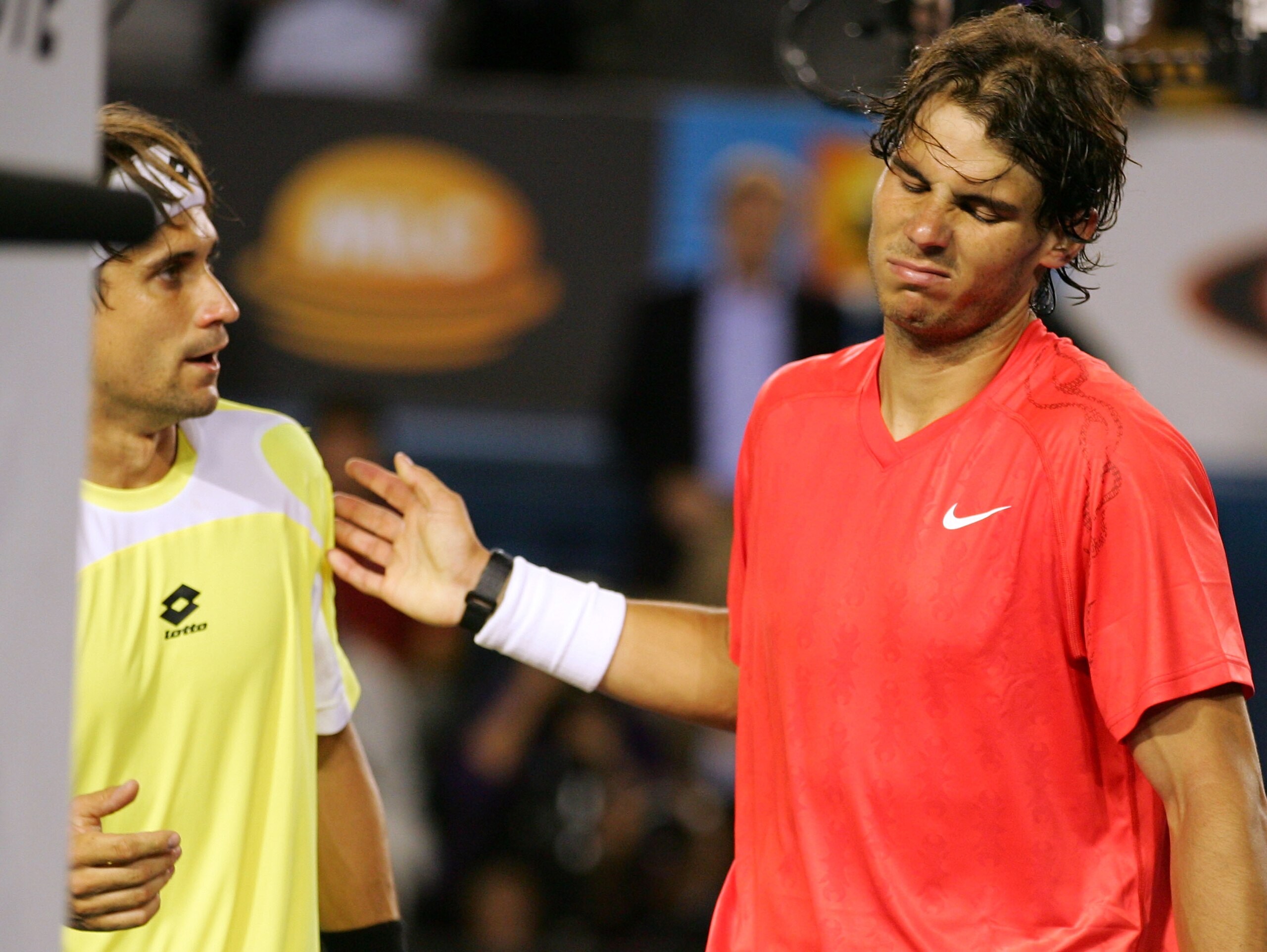 MELBOURNE, AUSTRALIA - JANUARY 26:  Rafael Nadal of Spain walks off court with David Ferrer of Spain in his victory in their quarterfinal match during day ten of the 2011 Australian Open at Melbourne Park on January 26, 2011 in Melbourne, Australia.  (Pho