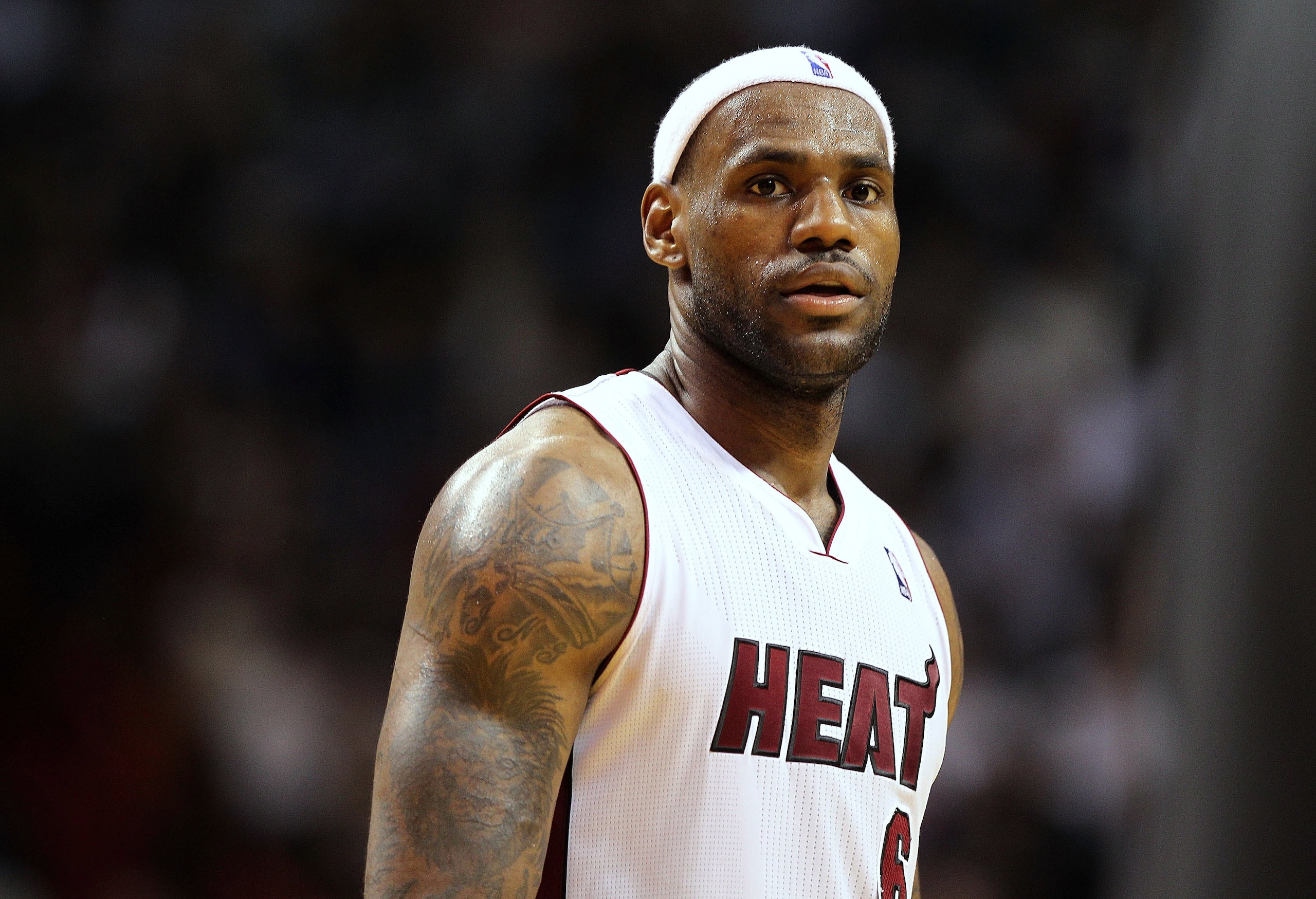 MIAMI, FL - JANUARY 22: LeBron James #6 of the Miami Heat looks on during a game against the Toronto Raptors at American Airlines Arena on January 22, 2011 in Miami, Florida. NOTE TO USER: User expressly acknowledges and agrees that, by downloading and/o MIAMI, FL - JANUARY 22: LeBron James #6 of the Miami Heat looks on during a game against the Toronto Raptors at American Airlines Arena on January 22, 2011 in Miami, Florida. NOTE TO USER: User expressly acknowledges and agrees that, by downloading and/o