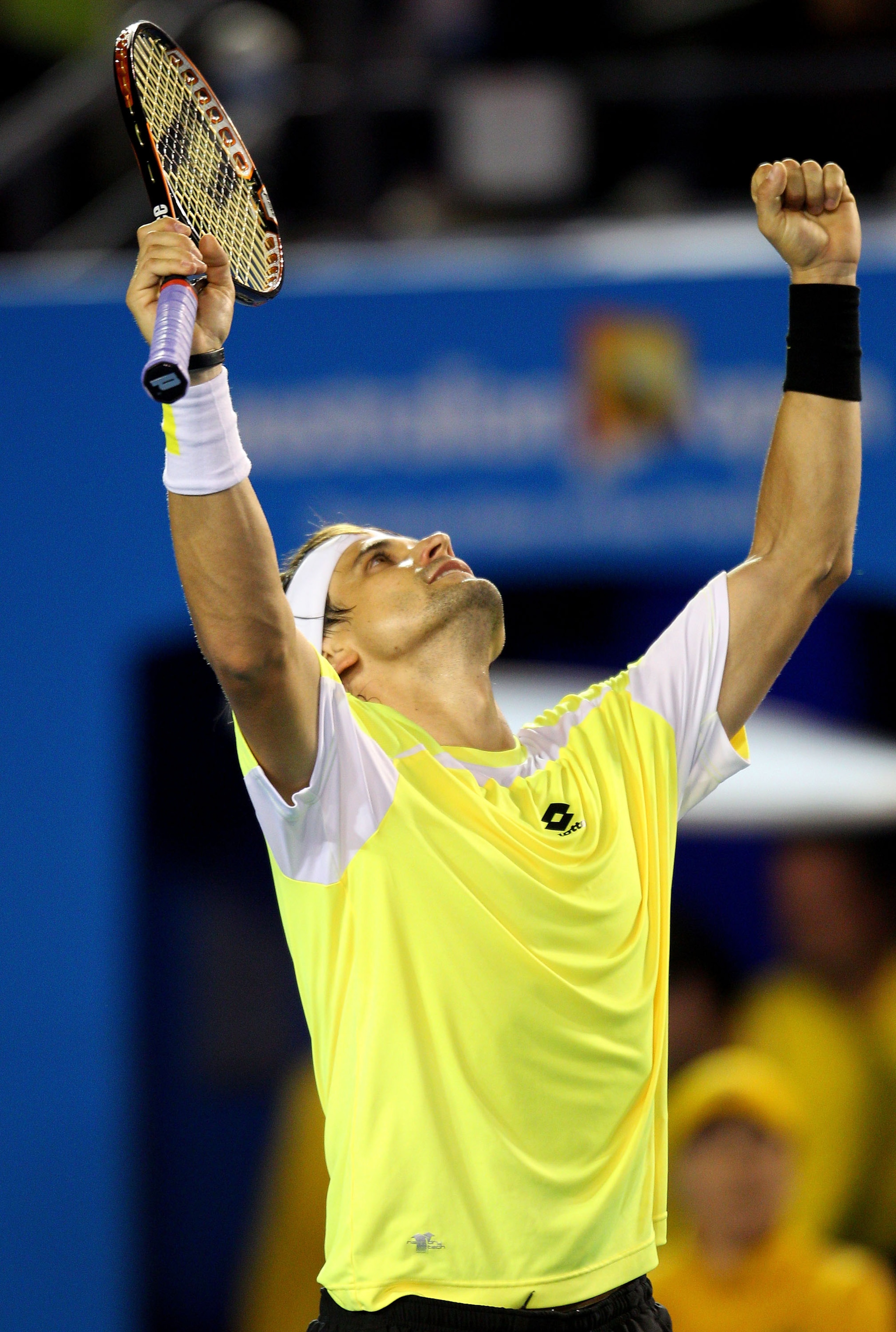 MELBOURNE, AUSTRALIA - JANUARY 26:  David Ferrer of Spain celebrates match point in his quarterfinal match against Rafael Nadal of Spain during day ten of the 2011 Australian Open at Melbourne Park on January 26, 2011 in Melbourne, Australia.  (Photo by S