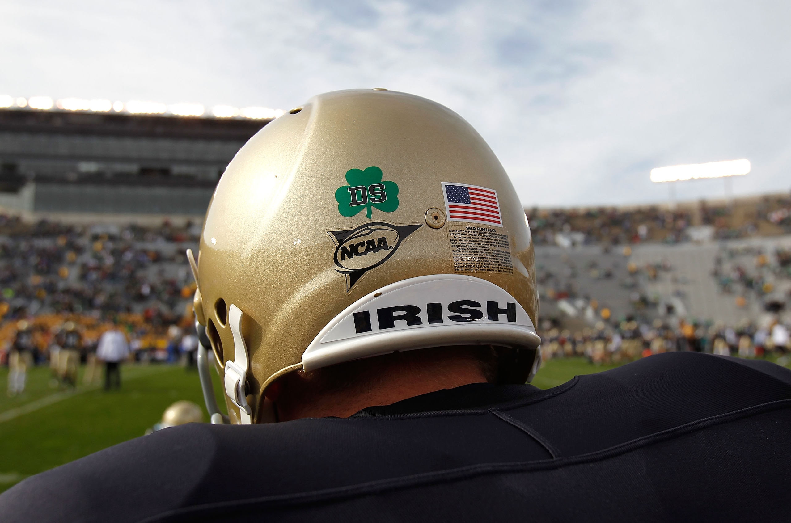 SOUTH BEND, IN - OCTOBER 30: A player for the Notre Dame Fighting Irish wears a decal on his helmut honoring Declan Sullivan, a student who was killed while videotaping a Notre Dame practice in high winds this past week, before a game against the Tulsa Go