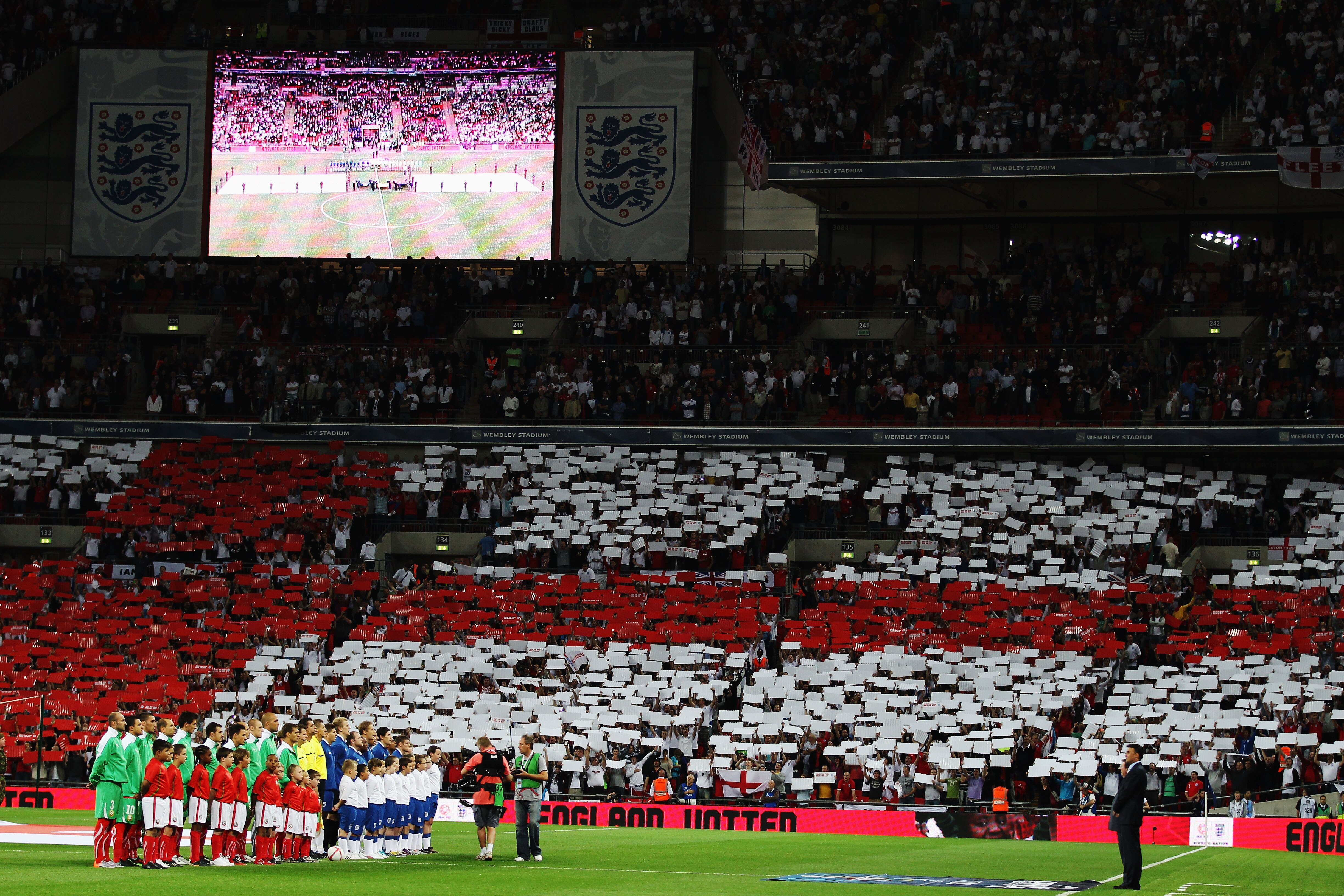 LONDON, ENGLAND - SEPTEMBER 03:  The teams line up for the national anthems before the UEFA EURO 2012 Group G Qualifying match between England and Bulgaria at Wembley Stadium on September 3, 2010 in London, England.  (Photo by Bryn Lennon/Getty Images)