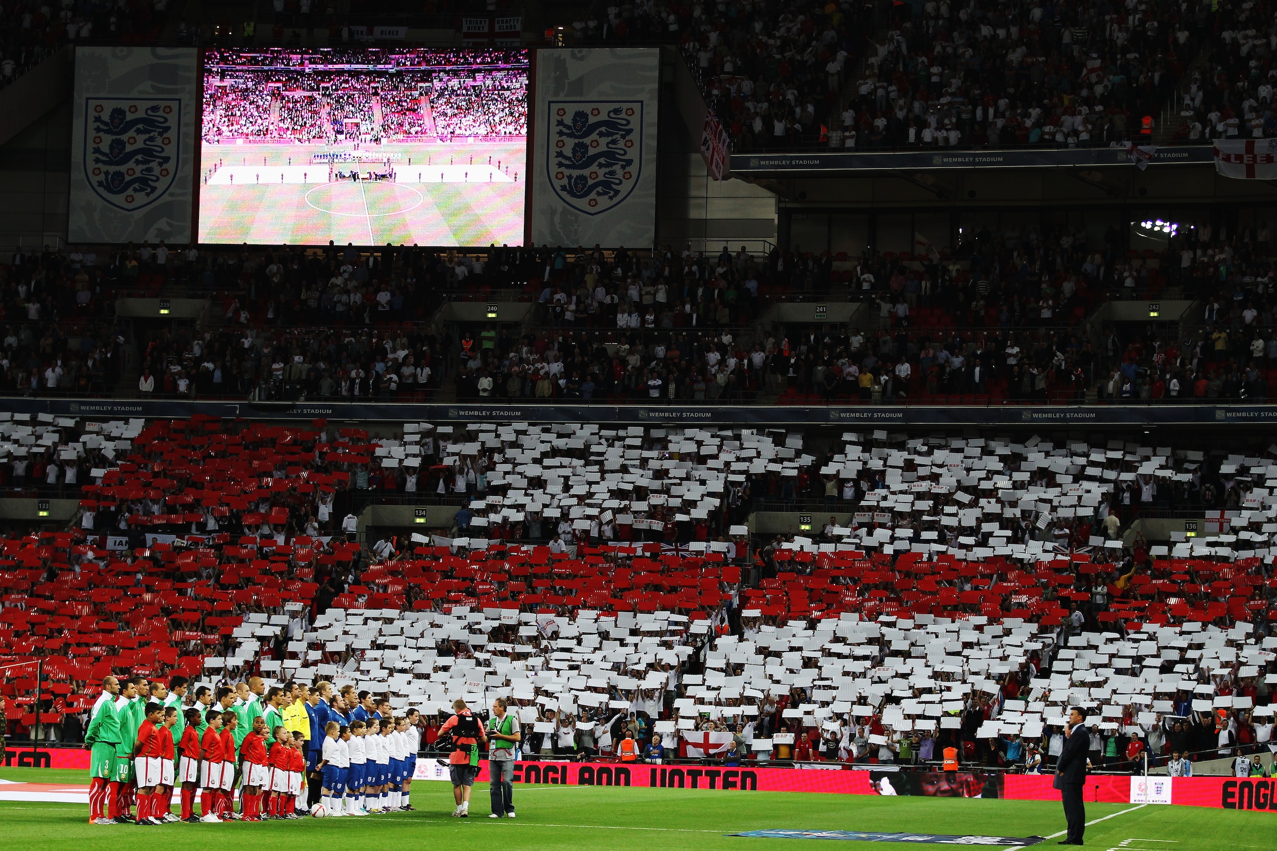 LONDON, ENGLAND - SEPTEMBER 03:  The teams line up for the national anthems before the UEFA EURO 2012 Group G Qualifying match between England and Bulgaria at Wembley Stadium on September 3, 2010 in London, England.  (Photo by Bryn Lennon/Getty Images)