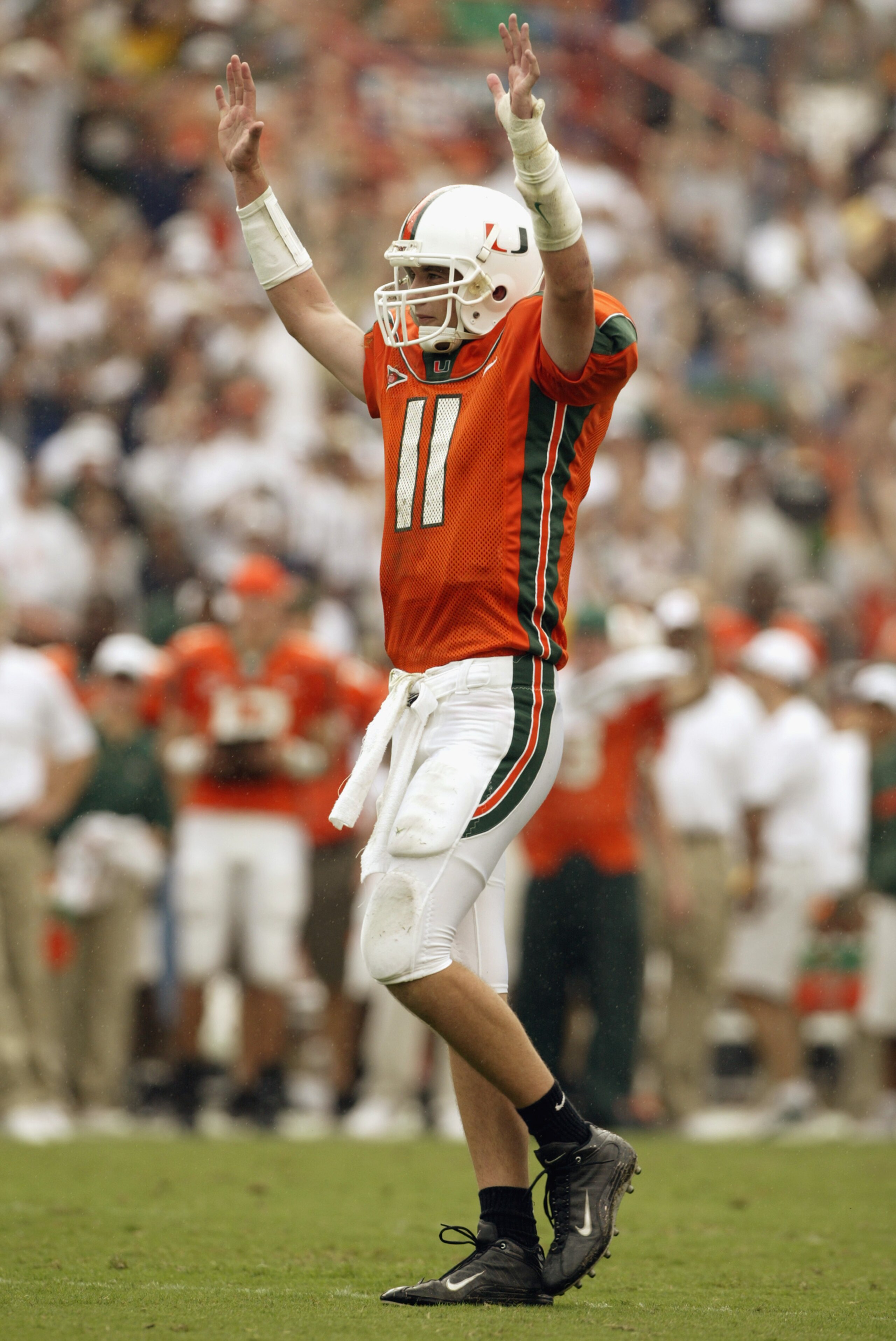 MIAMI - DECEMBER 7:  Quarterback Ken Dorsey #11 of the University of Miami Hurricanes celebrates during the game against the Virginia Polytechnic Institute and State University Hokies at the Orange Bowl on December 7, 2002 in Miami, Florida.  The Hurrican