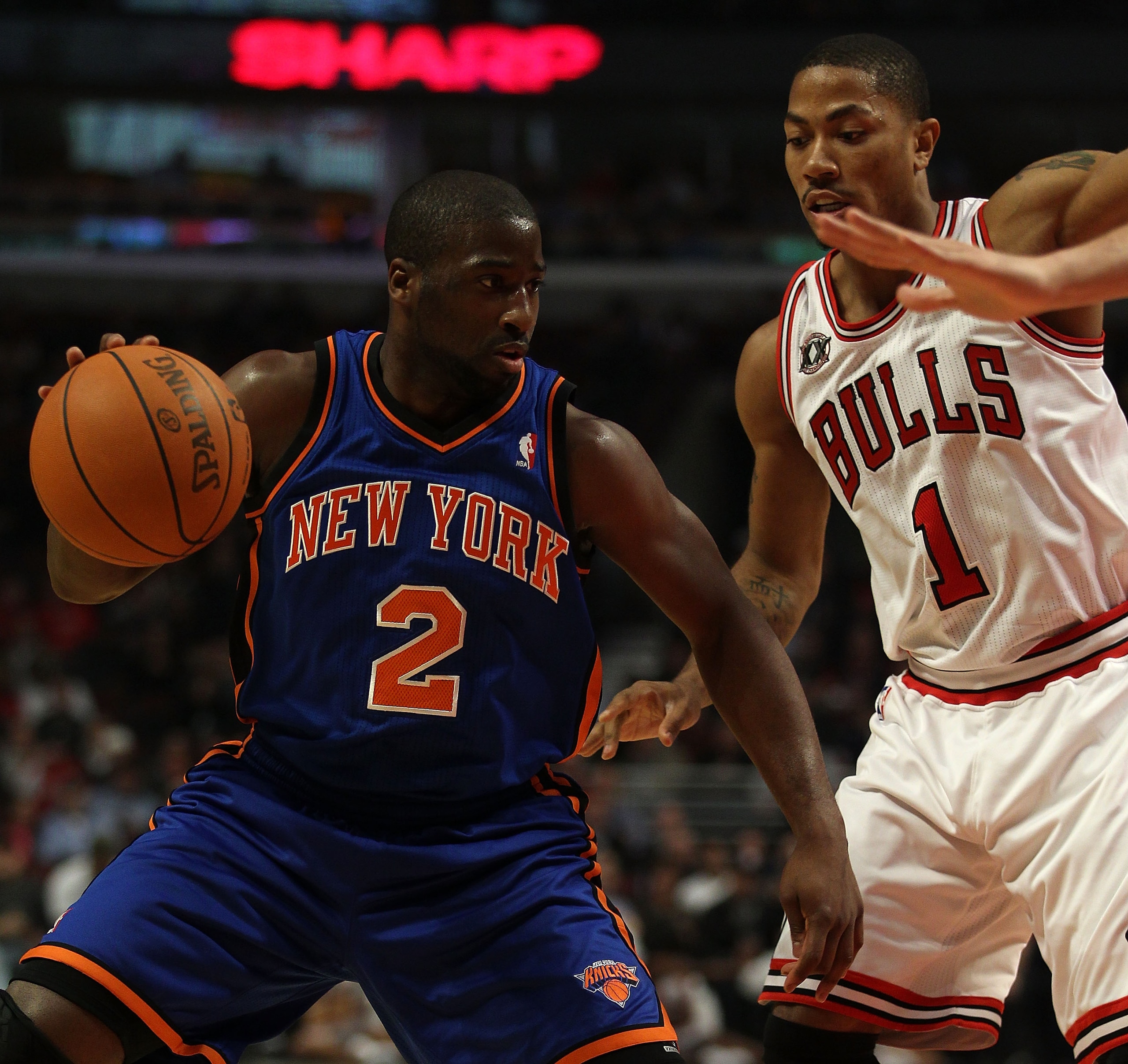 CHICAGO - NOVEMBER 04: Raymond Felton #2 of the New York Knicks moves against Derrick Rose #1 of the Chicago Bulls at the United Center on November 4, 2010 in Chicago, Illinois. NOTE TO USER: User expressly acknowledges and agrees that, by downloading and