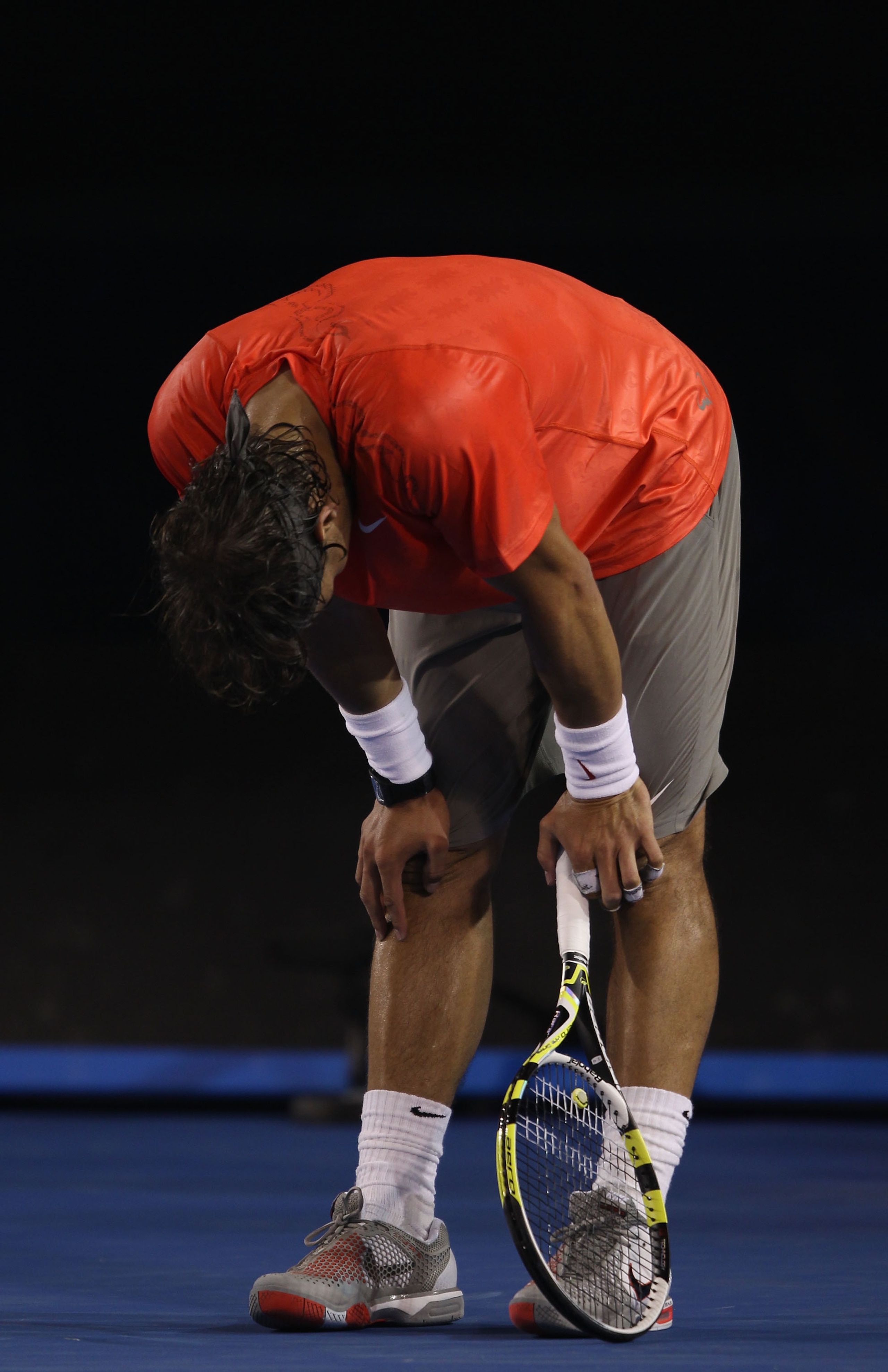 MELBOURNE, AUSTRALIA - JANUARY 26: Rafael Nadal of Spain reacts in his quarterfinal match against David Ferrer of Spain during day ten of the 2011 Australian Open at Melbourne Park on January 26, 2011 in Melbourne, Australia. (Photo by Clive Brunskill/G MELBOURNE, AUSTRALIA - JANUARY 26: Rafael Nadal of Spain reacts in his quarterfinal match against David Ferrer of Spain during day ten of the 2011 Australian Open at Melbourne Park on January 26, 2011 in Melbourne, Australia. (Photo by Clive Brunskill/G