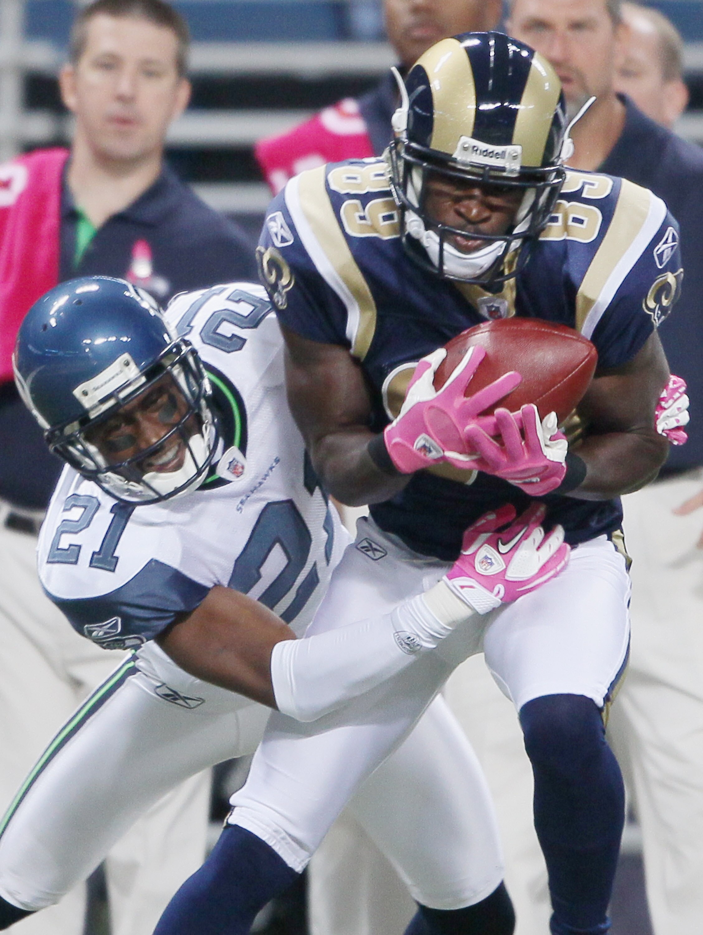 ST. LOUIS - OCTOBER 03:  Mark Clayton #89 of the St. Louis Rams catches the ball as Kelly Jennings #21 of the Seattle Seahawks on October 3, 2010 at Edward Jones Dome in St. Louis, Missouri.  (Photo by Elsa/Getty Images)