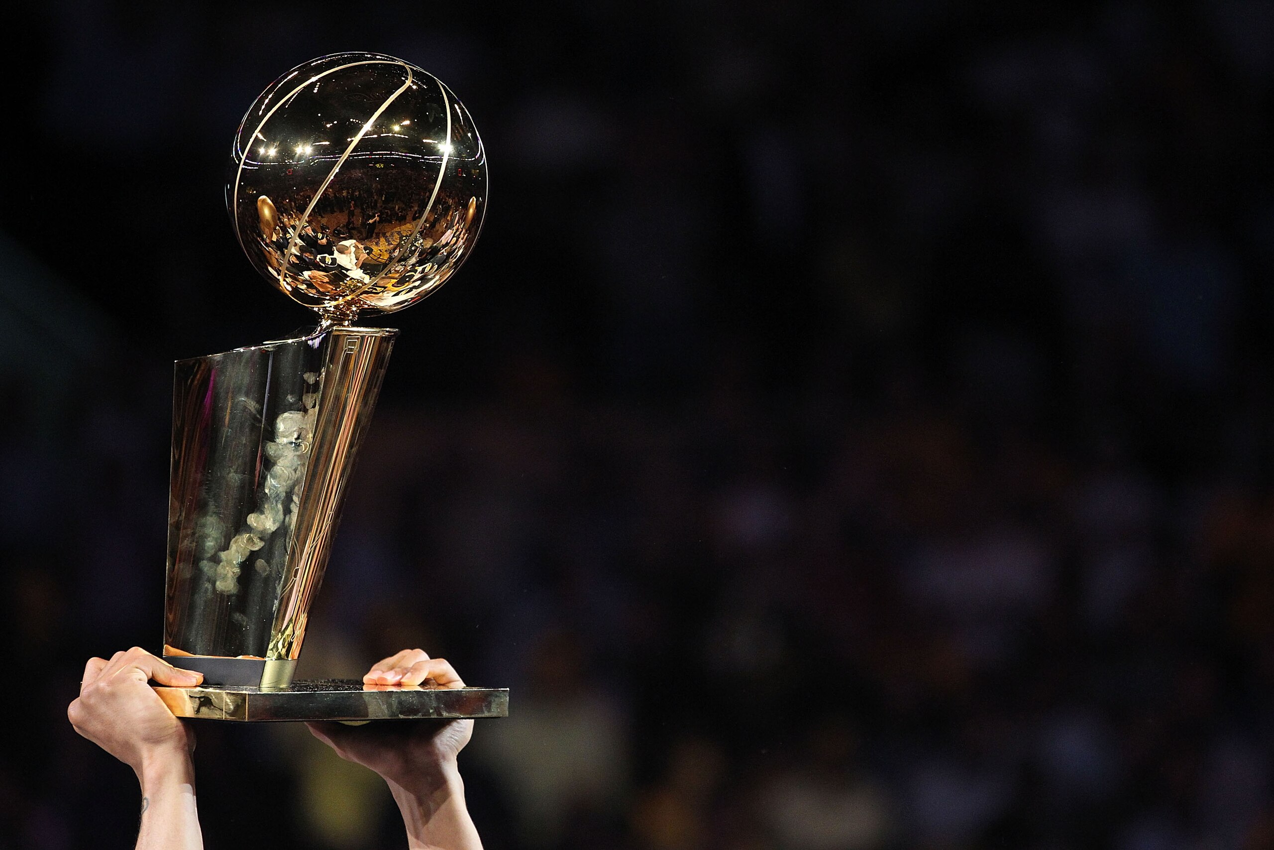 LOS ANGELES, CA - JUNE 17:  The Los Angeles Lakers hold up the Larry O'Brien Trophy after the Lakers defeated the Boston Celtics in Game Seven of the 2010 NBA Finals at Staples Center on June 17, 2010 in Los Angeles, California.  NOTE TO USER: User expres