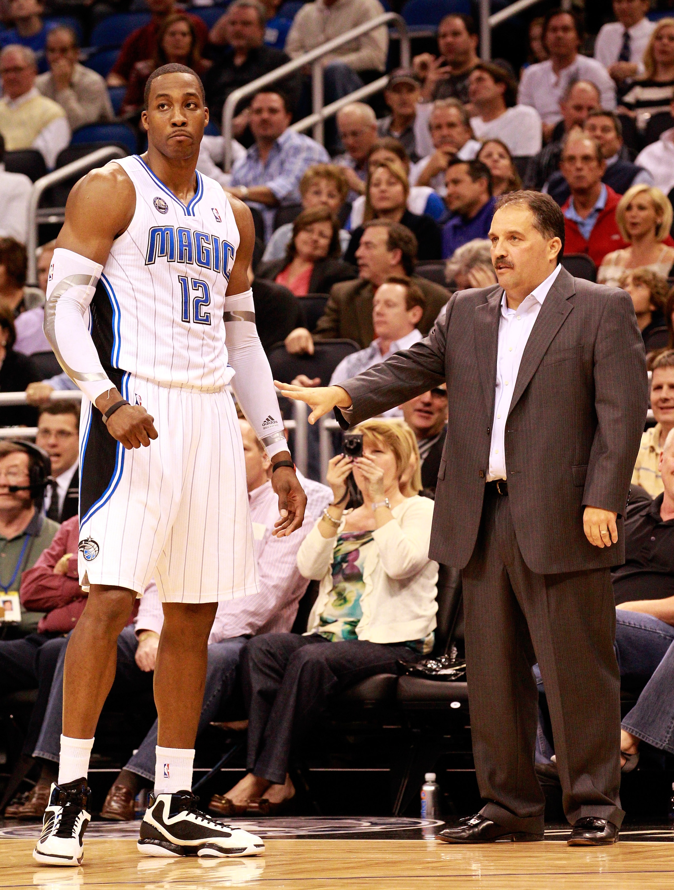 ORLANDO, FL - JANUARY 24:  Head coach Stan Van Gundy of the Orlando Magic talks with Dwight Howard #12 during the game against the Detroit Pistons at Amway Arena on January 24, 2011 in Orlando, Florida.  NOTE TO USER: User expressly acknowledges and agree