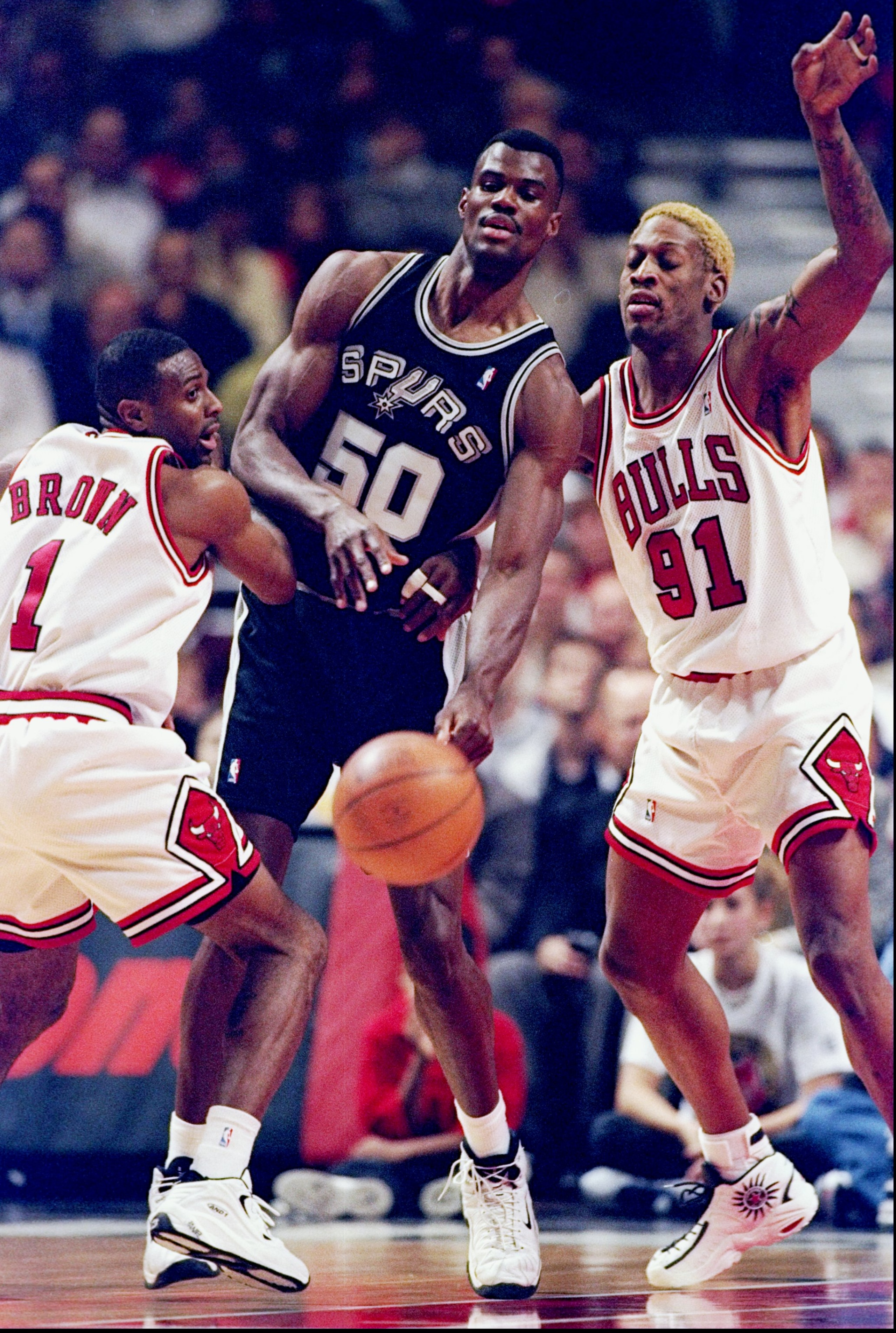 4 Nov 1997: Center David Robinson of the San Antonio Spurs is double teamed by forward Dennis Rodman and Randy Brown of the Chicago Bulls during a game at the United Center in Chicago, Illinois. The Bulls won the game 87-83 in overtime.