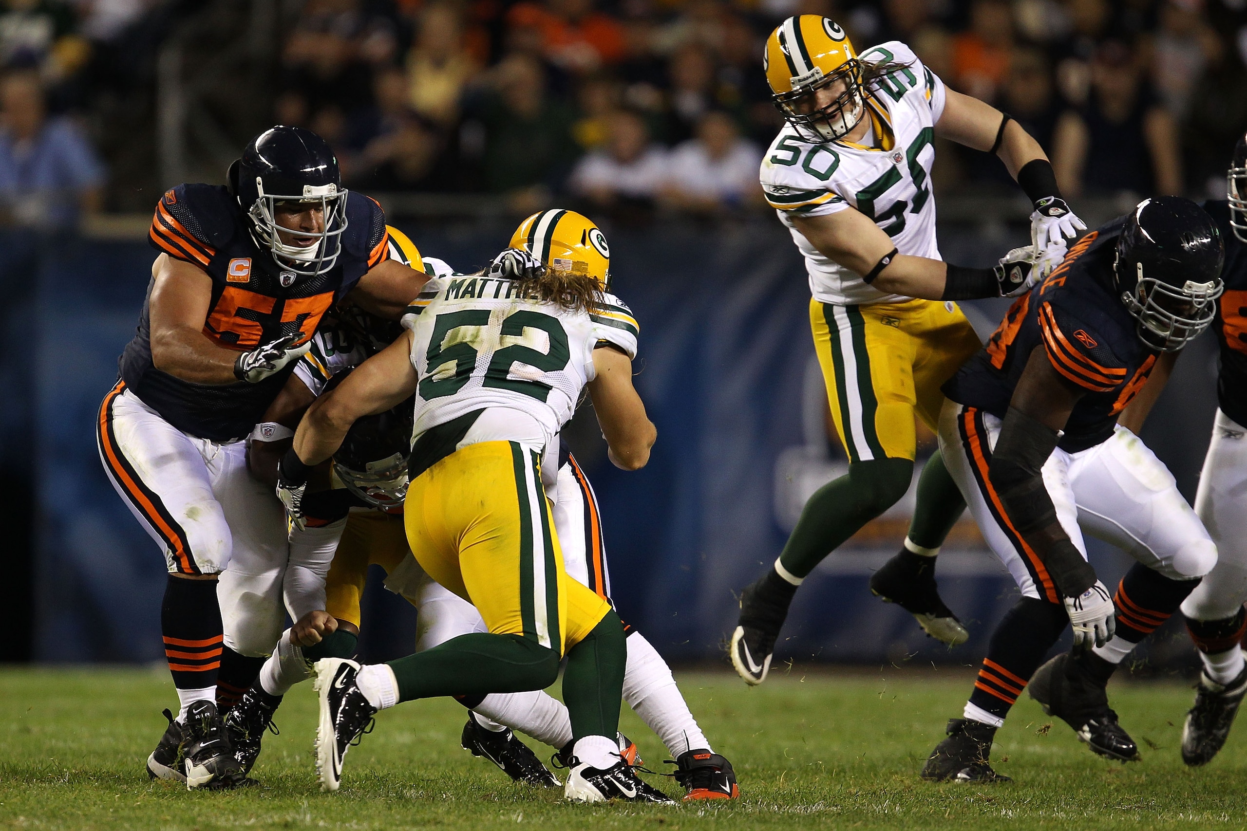 CHICAGO - SEPTEMBER 27: Linebackers Clay Matthews #52 and A.J. Wahk #50 of the Green Bay Packers defend against the Chicago Bears at Soldier Field on September 27, 2010 in Chicago, Illinois. (Photo by Jonathan Daniel/Getty Images) CHICAGO - SEPTEMBER 27: Linebackers Clay Matthews #52 and A.J. Wahk #50 of the Green Bay Packers defend against the Chicago Bears at Soldier Field on September 27, 2010 in Chicago, Illinois. (Photo by Jonathan Daniel/Getty Images)