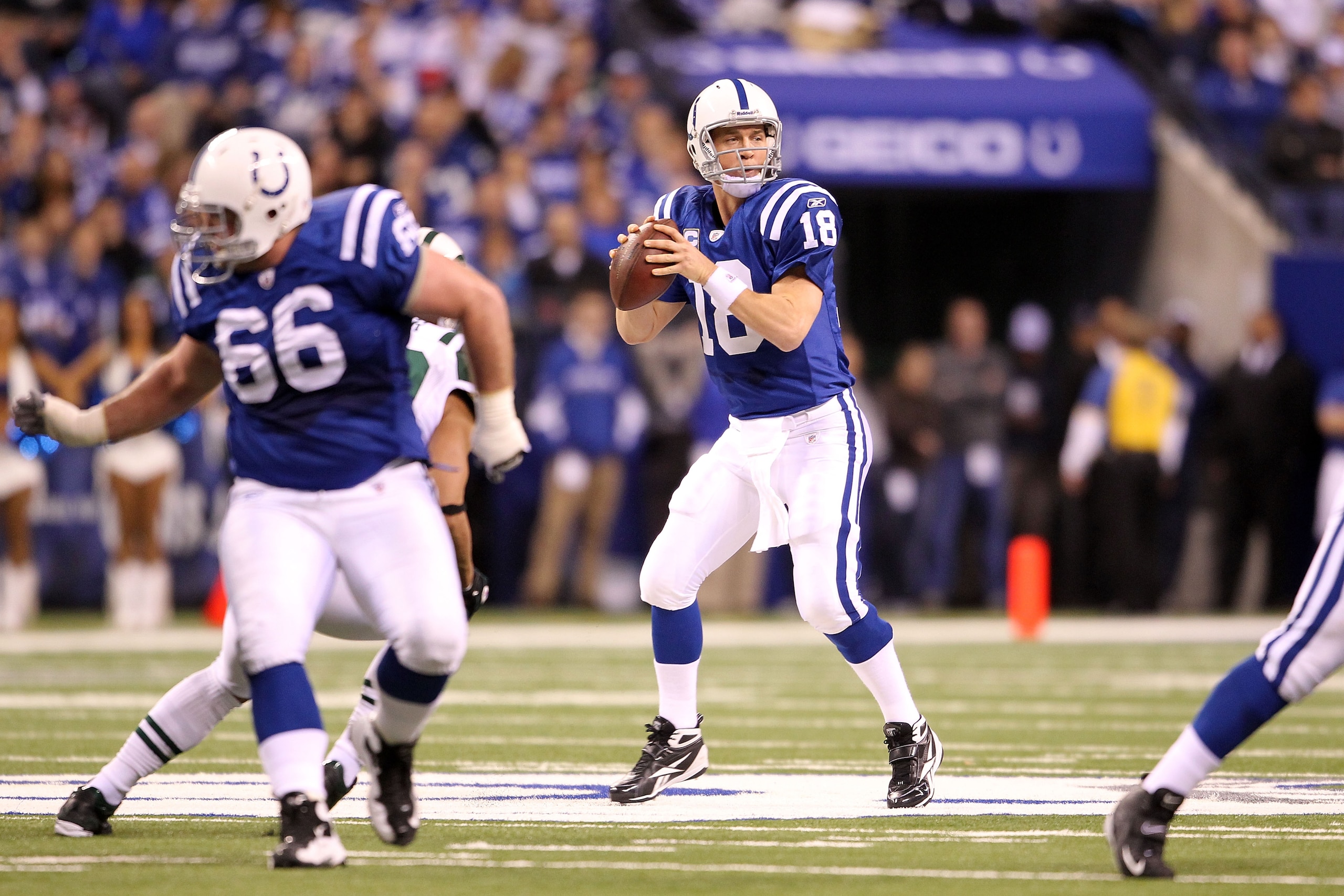 INDIANAPOLIS, IN - JANUARY 08: Quarterback Peyton Manning #18 of the Indianapolis Colts looks to pass against the New York Jets during their 2011 AFC wild card playoff game at Lucas Oil Stadium on January 8, 2011 in Indianapolis, Indiana. The Jets won 17 INDIANAPOLIS, IN - JANUARY 08: Quarterback Peyton Manning #18 of the Indianapolis Colts looks to pass against the New York Jets during their 2011 AFC wild card playoff game at Lucas Oil Stadium on January 8, 2011 in Indianapolis, Indiana. The Jets won 17