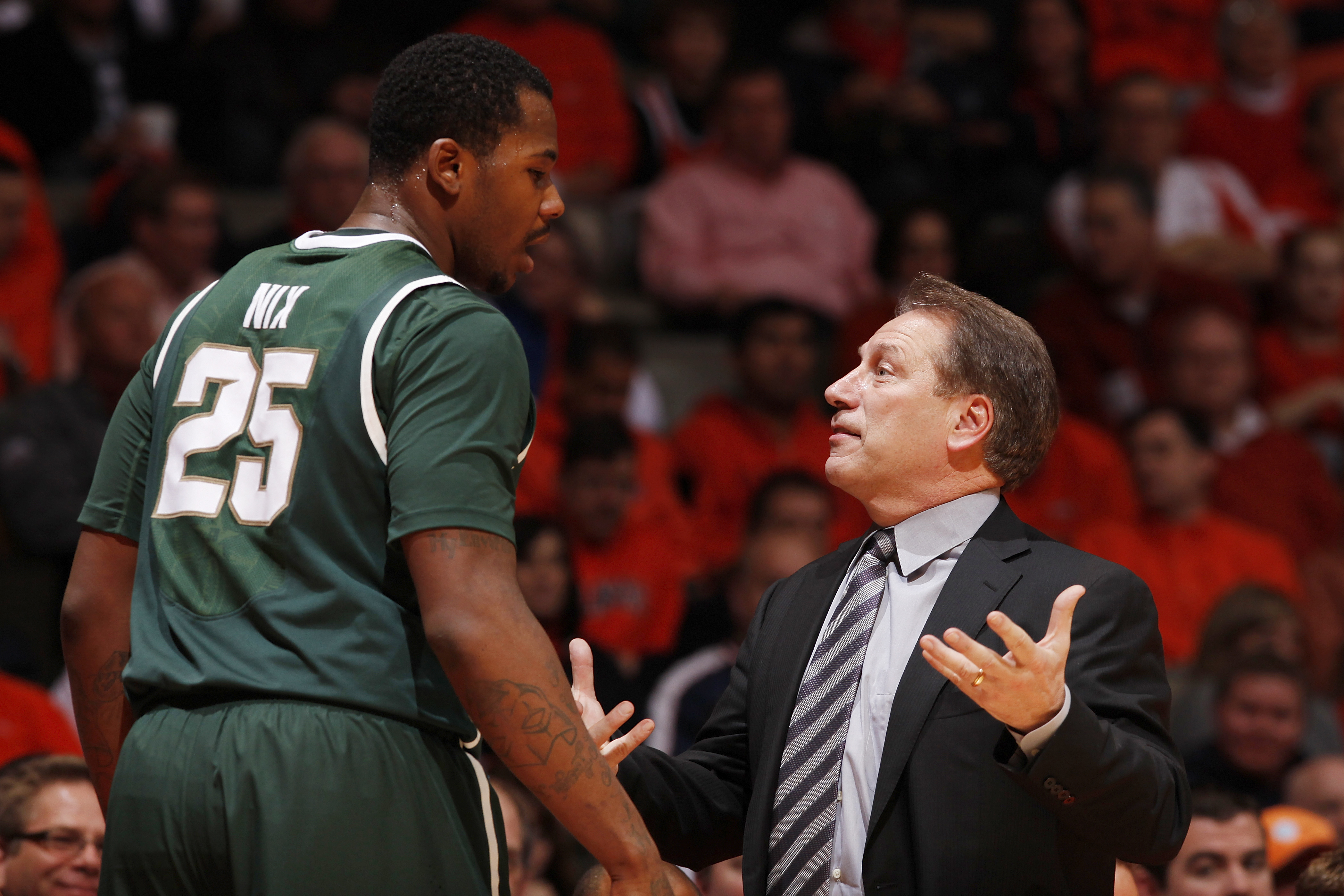 CHAMPAIGN, IL - JANUARY 18: Head coach Tom Izzo of the Michigan State Spartans talks with Derrick Nix #25 during the game against the Illinois Fighting Illini at Assembly Hall on January 18, 2011 in Champaign, Illinois. Illinois defeated Michigan State 71