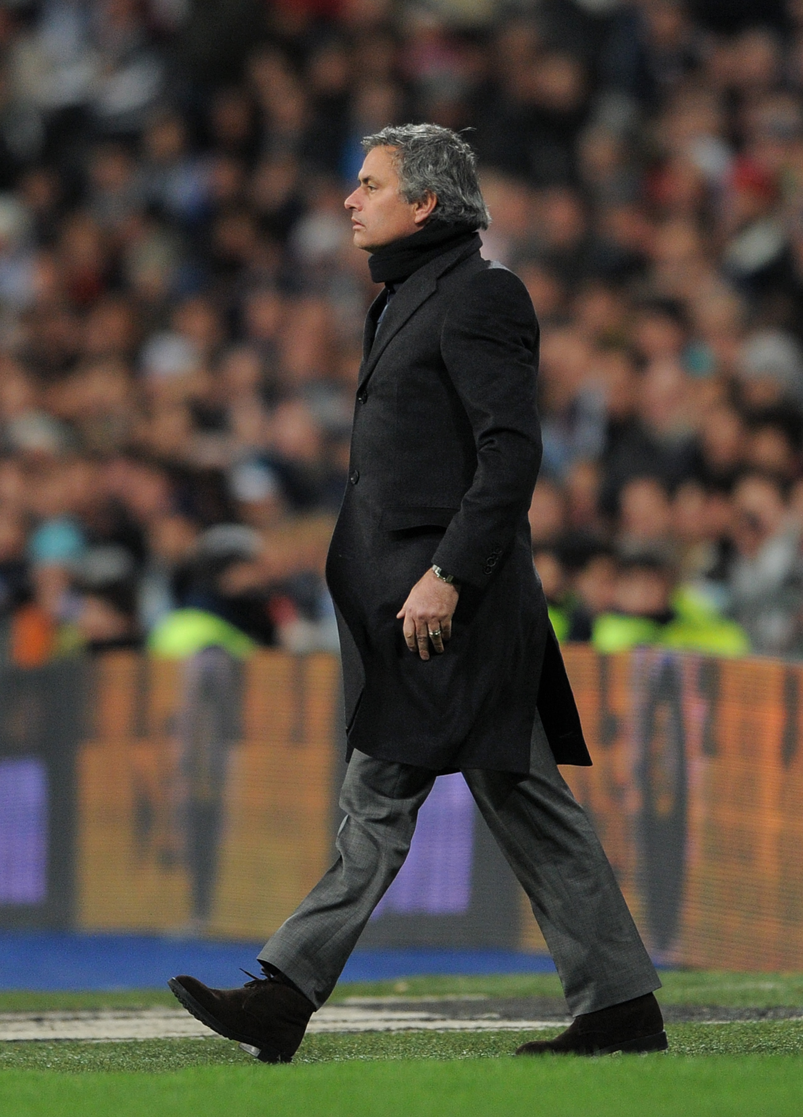 MADRID, SPAIN - JANUARY 23:  Head coach Jose Mourinho of Real Madrid follows the game during the la liga match between Real Madrid and Mallorca at Estadio Santiago Bernabeu on January  23, 2011 in Madrid, Spain.  (Photo by Jasper Juinen/Getty Images)