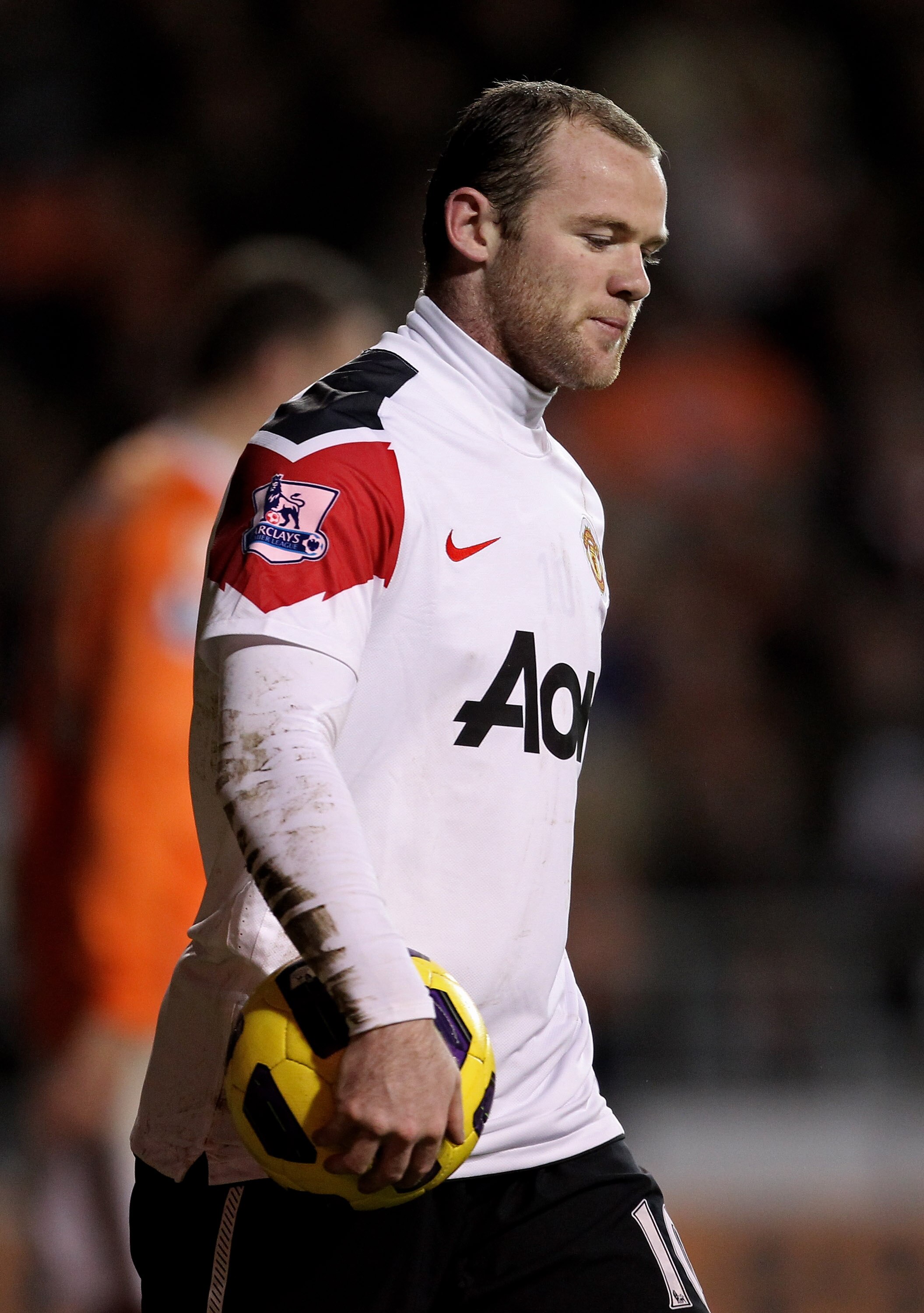 BLACKPOOL, ENGLAND - JANUARY 25:   Wayne Rooney of Manchester United looks on during the Barclays Premier League match between Blackpool and Manchester United at Bloomfield Road on January 25, 2011 in Blackpool, England. (Photo by Alex Livesey/Getty Image