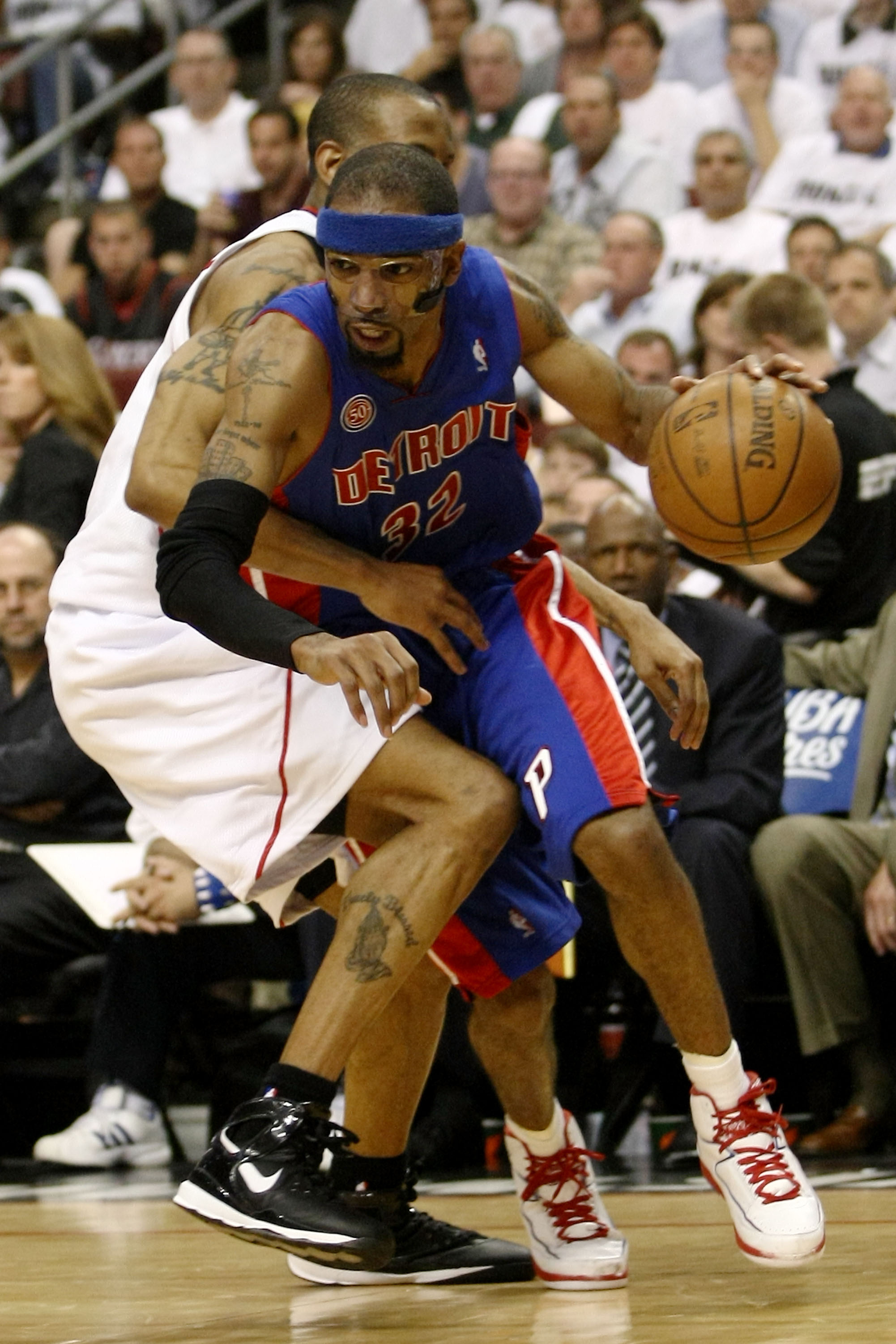 PHILADELPHIA - APRIL 25:  Richard Hamilton #32 of the Detroit Pistons drives past Andre Iguodala #9 of the Philadelphia 76ers in Game Three of the Eastern Conference Quarterfinals during the 2008 NBA Playoffs on April 25, 2008 at the Wachovia Center in Ph