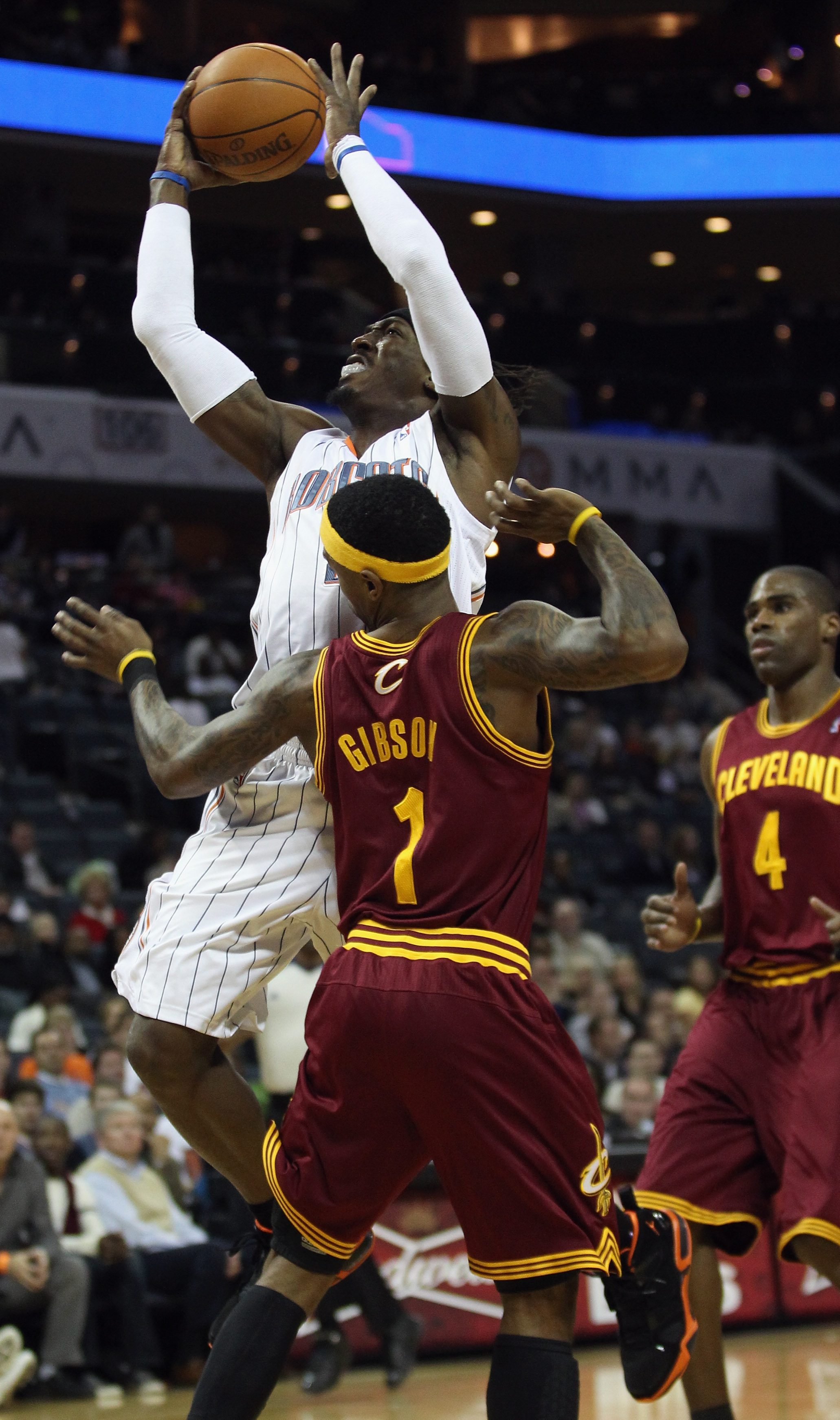 CHARLOTTE, NC - DECEMBER 29:  Daniel Gibson #1 of the Cleveland Cavaliers backs away from Gerald Wallace #3 of the Charlotte Bobcats during their game at Time Warner Cable Arena on December 29, 2010 in Charlotte, North Carolina. NOTE TO USER: User express