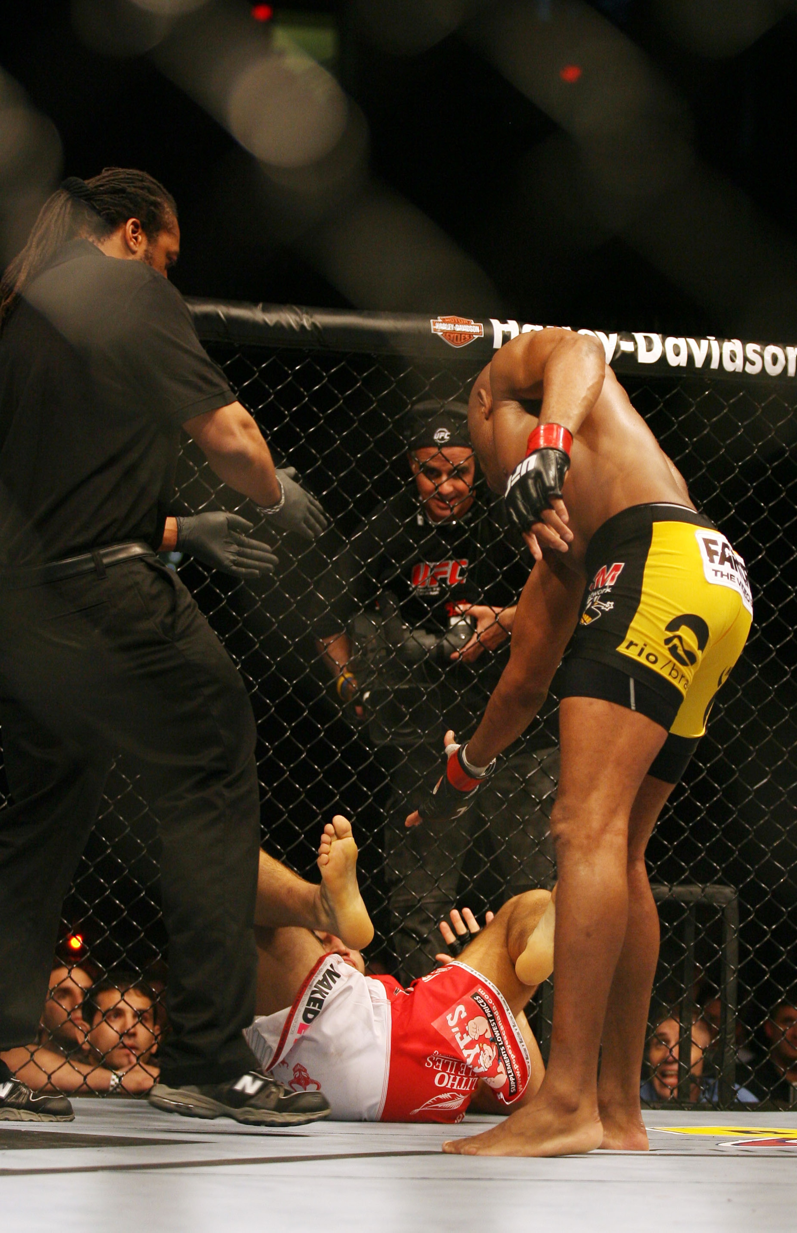 CHICAGO- OCTOBER 25: Anderson Silva tries to get Patrick Cote to get up in the Middleweight Title Bout at UFC's Ultimate Fight Night at Allstate Arena on October 25, 2008 in Chicago, Illinois. (Photo by Tasos Katopodis/Getty Images) CHICAGO- OCTOBER 25: Anderson Silva tries to get Patrick Cote to get up in the Middleweight Title Bout at UFC's Ultimate Fight Night at Allstate Arena on October 25, 2008 in Chicago, Illinois. (Photo by Tasos Katopodis/Getty Images)