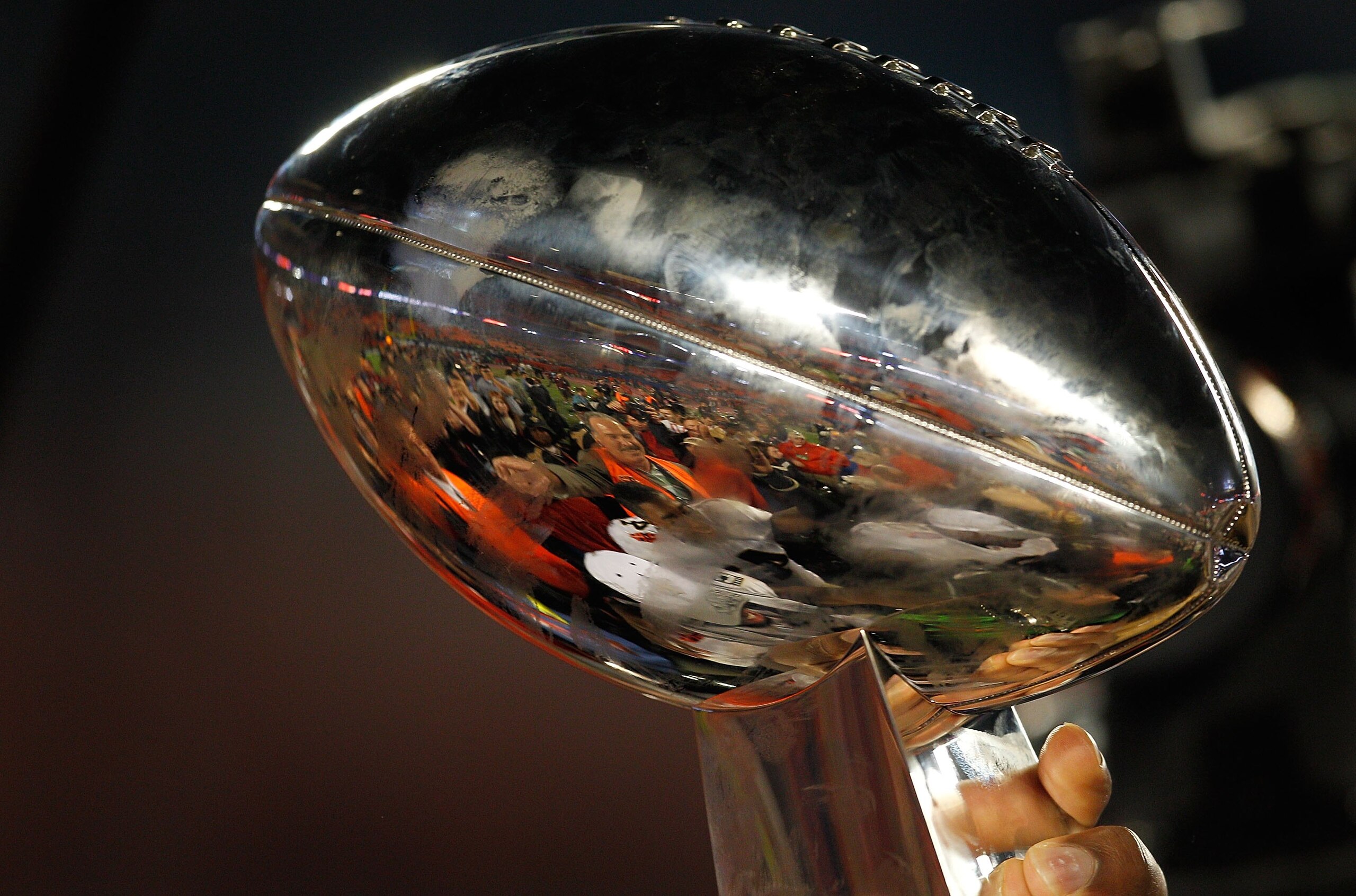 MIAMI GARDENS, FL - FEBRUARY 07:  A detail of the Vince Lombardi Trophy as the New Orleans Saints celebrate after defeating the Indianapolis Colts during Super Bowl XLIV on February 7, 2010 at Sun Life Stadium in Miami Gardens, Florida.  (Photo by Jonatha